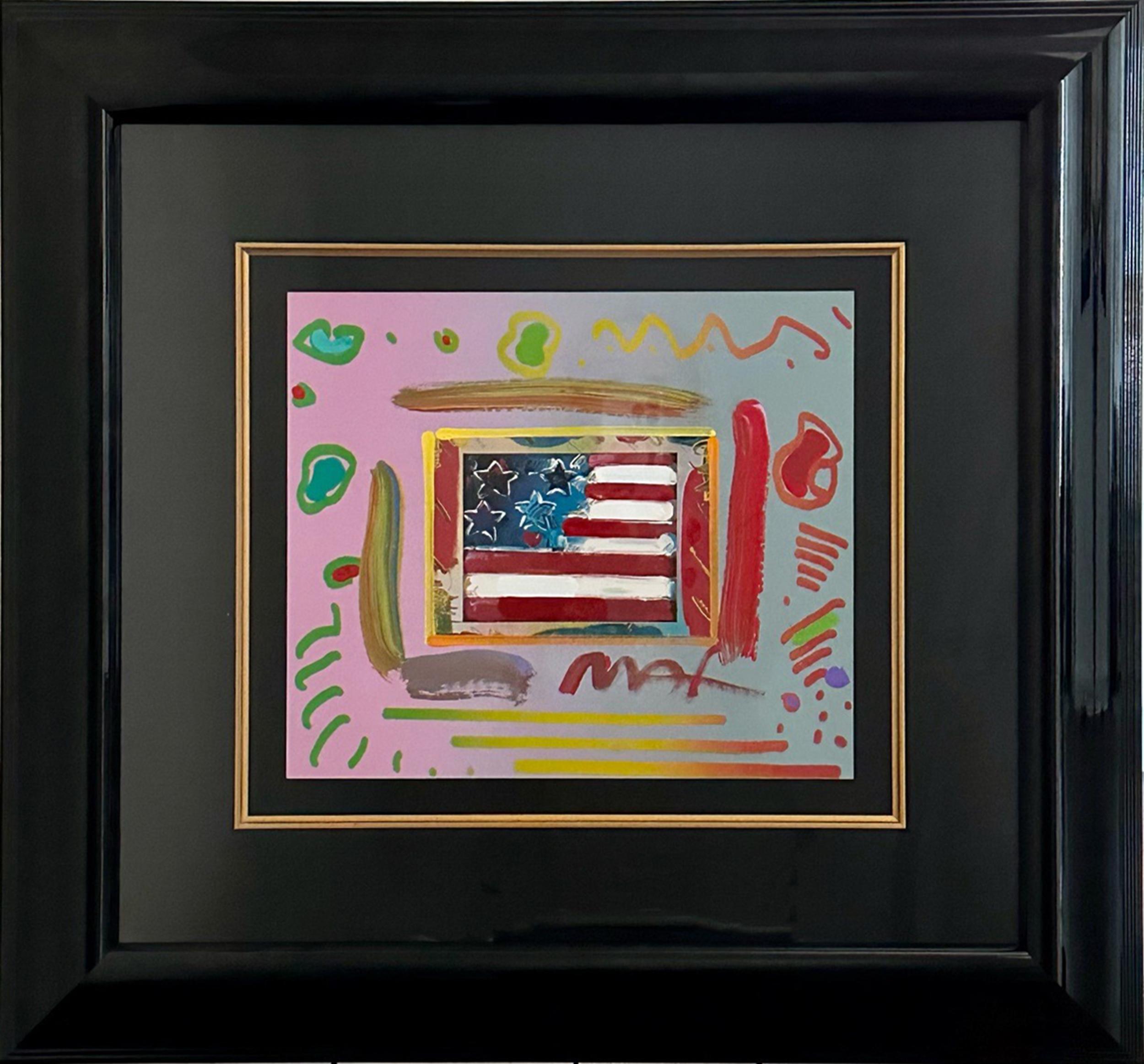 A simply framed example of Peter Max’s American flag paintings, one of his most used motifs other than the Statue of Liberty. The simplified flag bears only 4 stars plus a small heart in the upper left. The rest of the flag consists of 5 red stripes