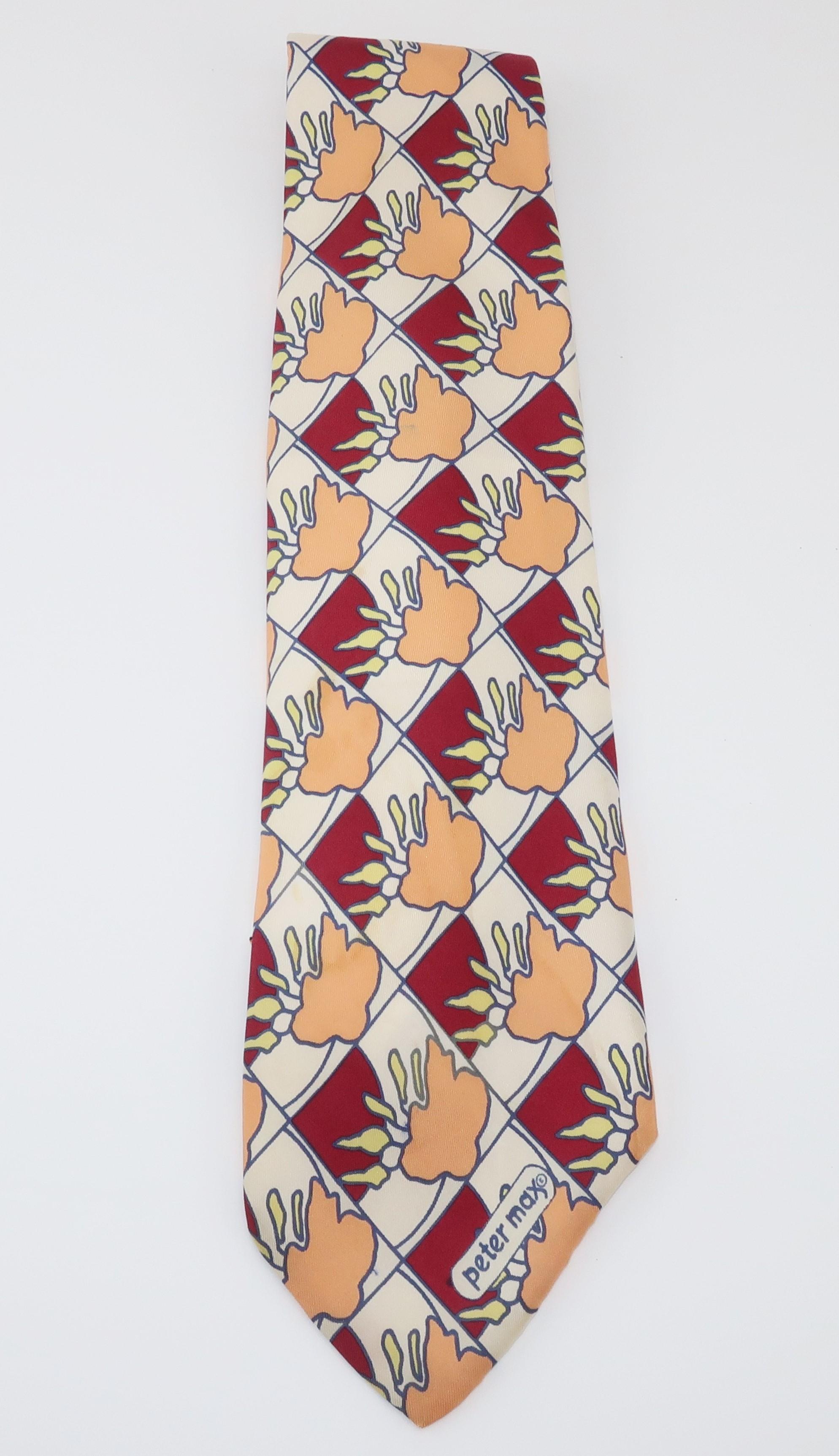 Peter Max made a name for himself in the 1960's by incorporating cultural influences of the psychedelic era into his pop art including wearable art such as this mod Italian silk necktie.  The colorful pattern includes shades of maroon red, blue,