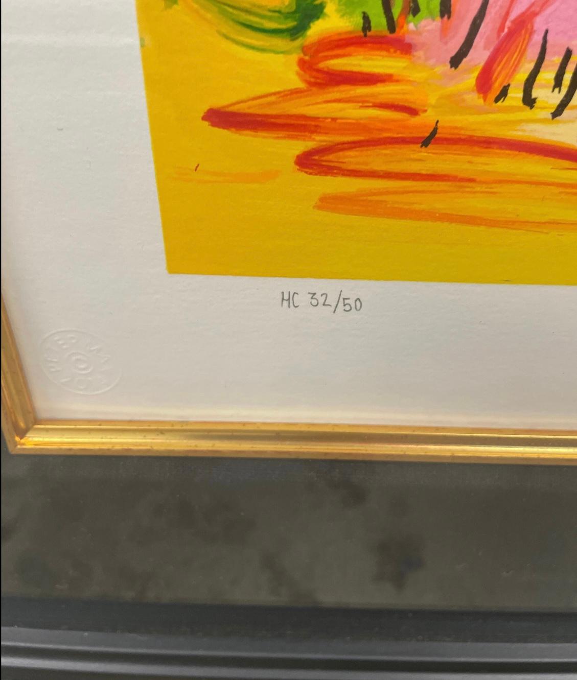 This is an Peter Max signed and number lithograph “quiet lake”. In good condition. Frame has some minor scratches.