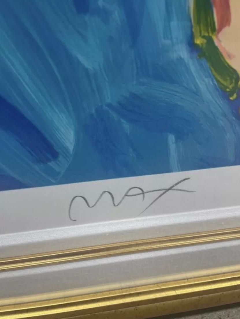 This is an Peter Max lithograph signed and numbered “statue of Liberty 2014”. Out of 300 gold frame. In excellent condition. Measures 50x33