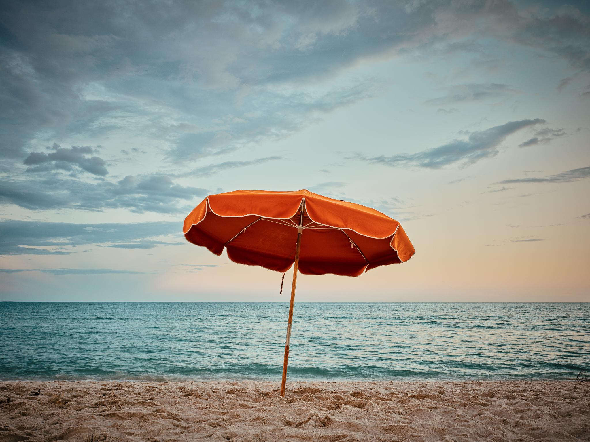 Peter Mendelson Color Photograph - "Lone Umbrella, " Contemporary Coastal Photograph, 24" x 32"