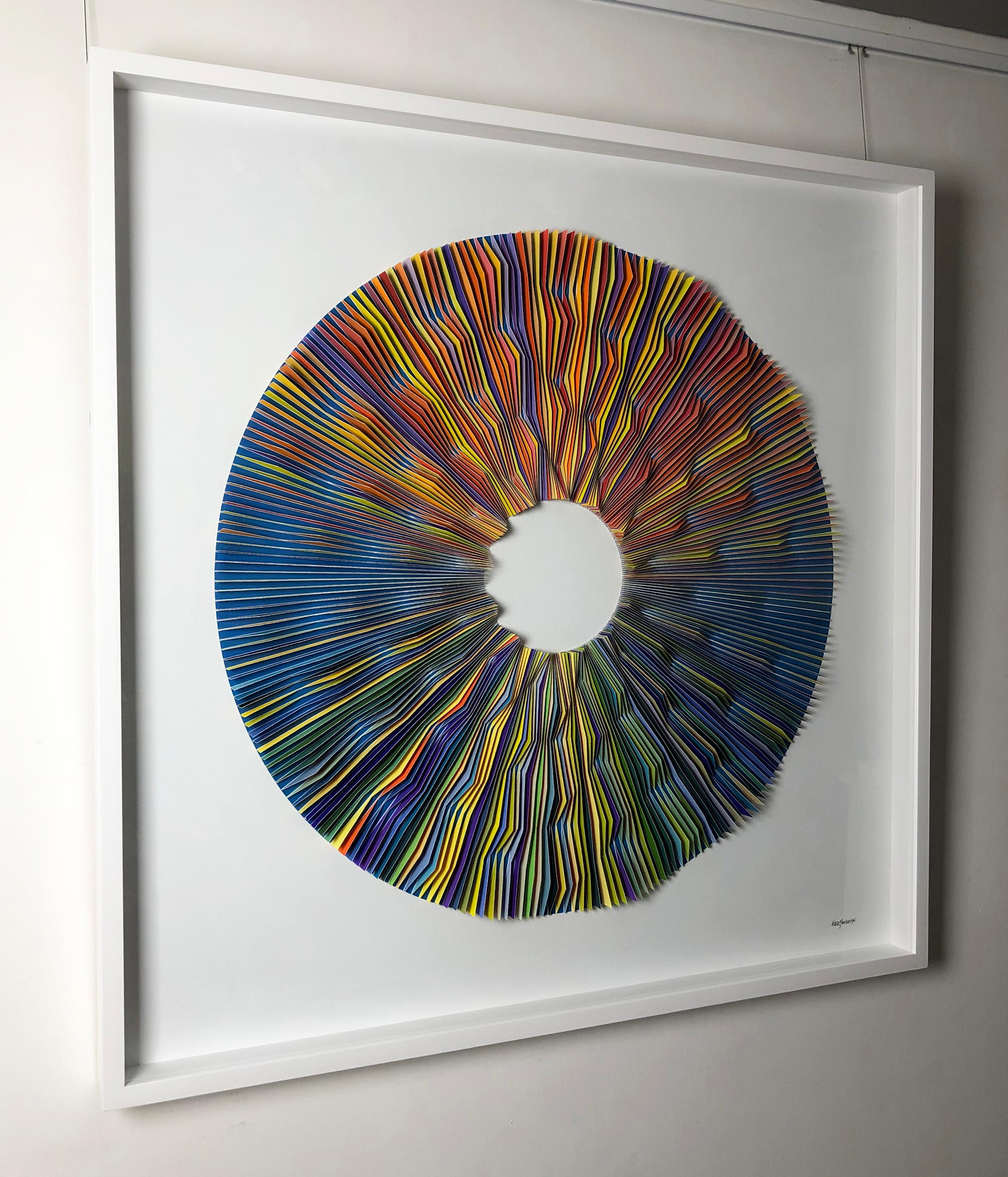 'Radiating Lines Blue' by Peter Monaghan, 113 x 113cm, mixed media, 2019. Signed by the artist at the back.

Peter Monaghan was born in Ireland in 1955 and studied at the National College of Art and Design in the mid 1970s. He then joined Dara
