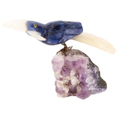 Sculpture géode oiseau en pierres précieuses d'améthyste et de lapis-lazuli, sculptée par I Muller 
