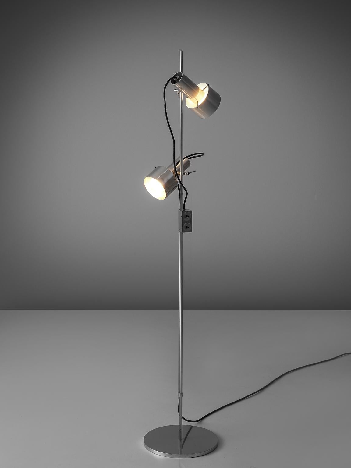 Peter Nelson for Architectural Lighting, floor lamp, aluminum, circa 1970.

This floor lamp is designed by Peter Nelson and manufactured by Architectural Lighting. It is an engineered piece executed in aluminum and therefore gives of a very