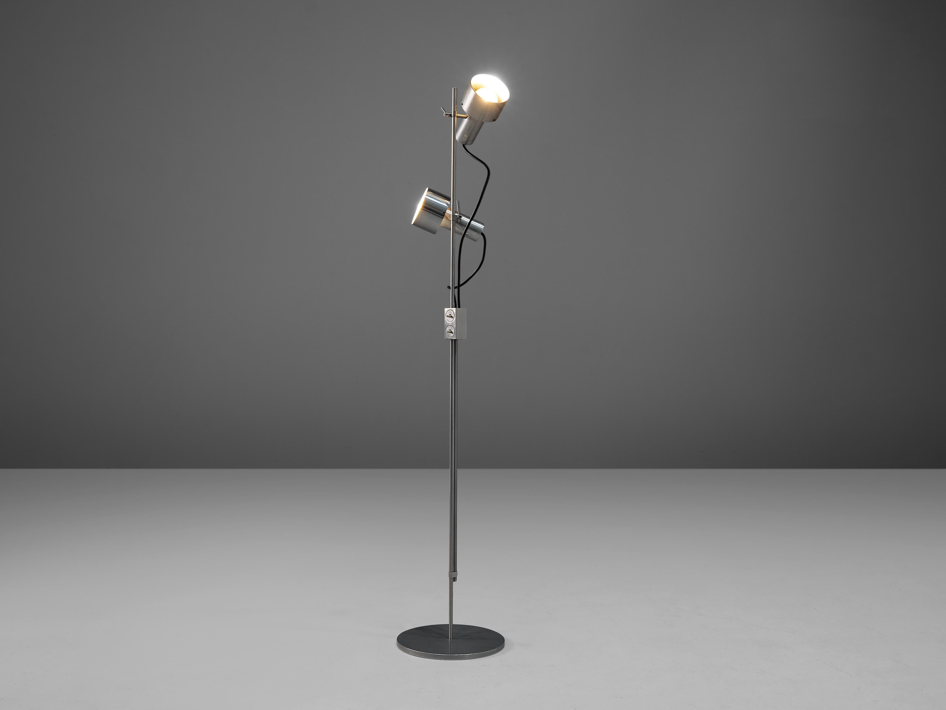 Peter Nelson for Architectural lighting, floor lamp, aluminum, United Kingdom, 1970s

These floor lamps are designed by Peter Nelson and manufactured by Architectural Lighting. They are an engineered piece executed in aluminum and therefore give