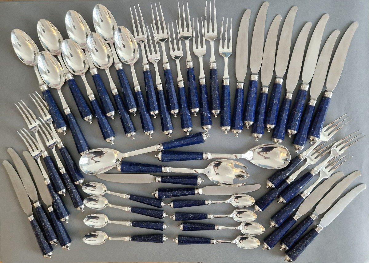 Cutlery Flatware Set of 51 pieces in sterling silver and lapis lazuli 
The handles with cut sides, the forks, ferrules and bases in silver. 
Consisting of: 
8 starter forks: 19.5 cm 
8 starter knives: 20.6 cm 
8 table forks: 21 cm 
8 table spoons: