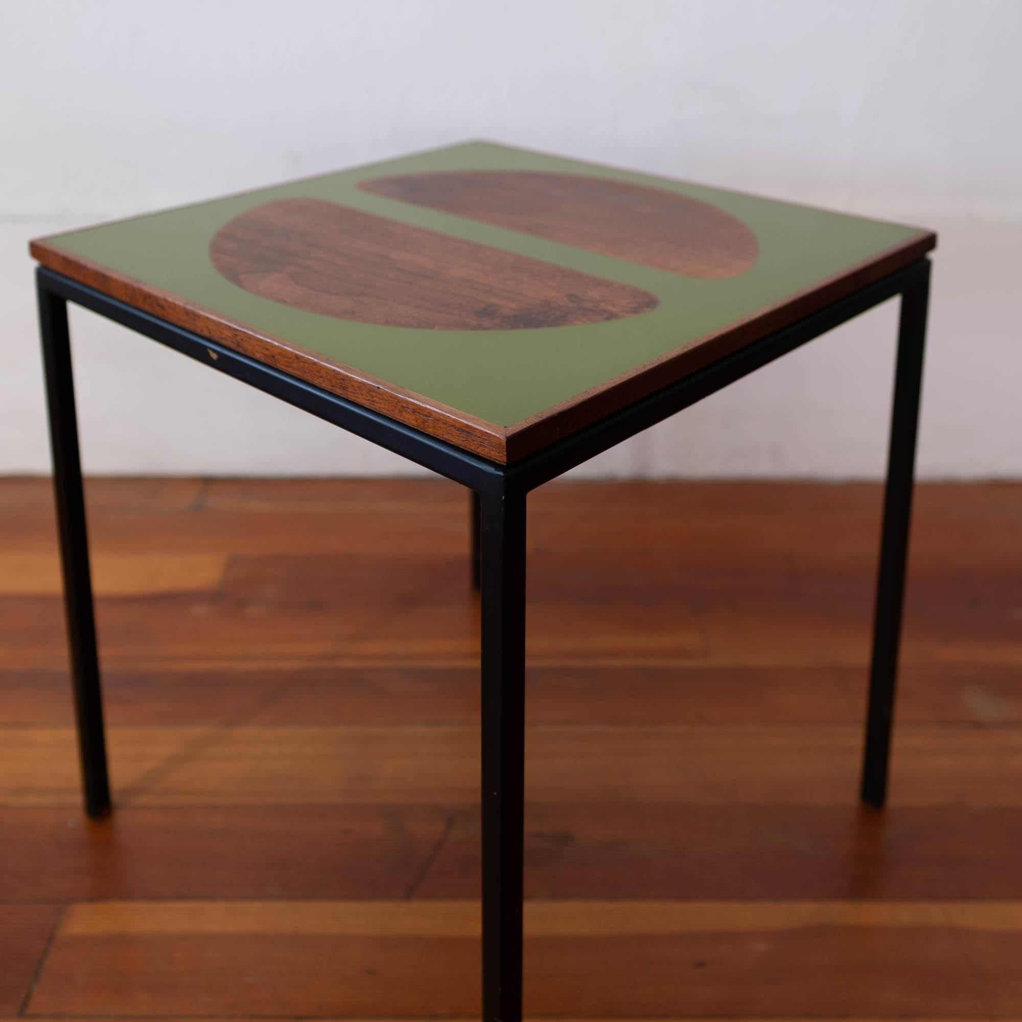 Peter Pepper Products occasional table designed by Howard McNab and Don Savage. Inlaid plastic and walnut on a steel frame. Palos Verdes Estates, California, 1960s.

Literature: California Design Eight (Pasadena Museum of Art) and California