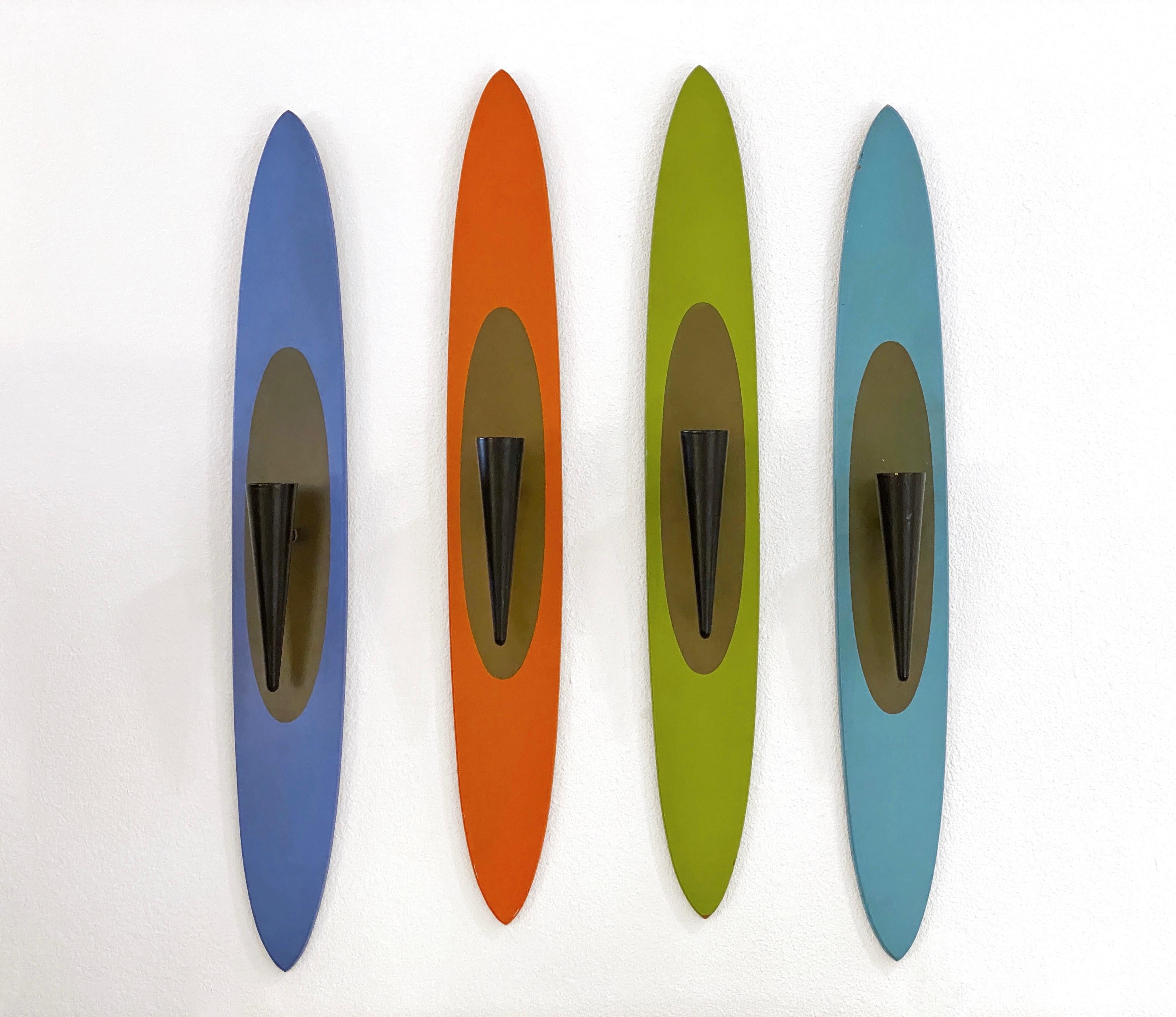 Peter Pepper Products Palos Verdes California Surfboard Candle Holders ca 1950s

Fun and original set of four 1950s wall sconces manufactured by Peter Pepper Products in Palos Verdes, California, ca 1950s. The sconces are purple, orange, green and