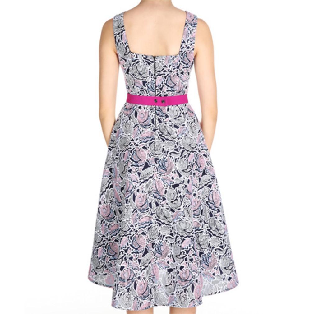 Designed with the utmost style, this Peter Pilotto dress is absolute perfection. Its round neckline and sleeveless top is coupled with a dark pink waist contrasting its black, light pink, and white print. This item does not include the accessories