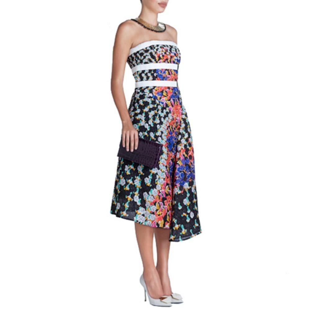 Another masterpiece by Peter Pilotto, this printed dress is perfect for a summer wedding. Its smooth material is printed with fun shades, constrasted with a simply asymmetrical cut, a knee-length hem, and a sleeveless top with white stripes.

This