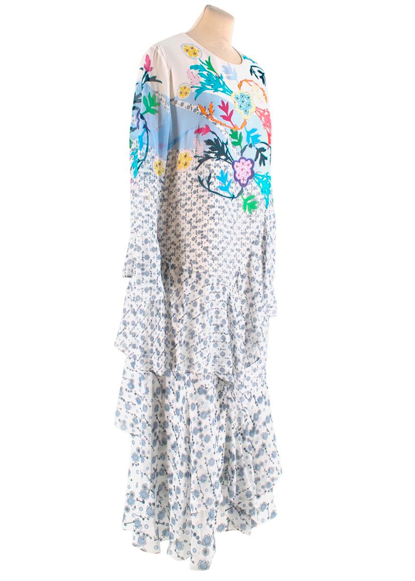 Peter Pilotto Floral Printed Silk Maxi Dress 

- Rounded Neckline 
- Ruffled Skirt 
- Long Sleeve
- Maxi Length Skirt 
- Lined 
- Back Zip Closure 


Materials 
100% Silk 

Dry Clean Only 

Made in Poland 

Measurements are taken with the item lying