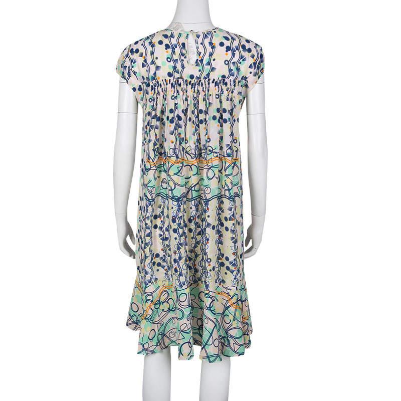 Peter Pilotto is known for their vibrant use of colors and playful prints, and this dress is crafted in true label's style. Cut from silk, the dress has fluid structure and will look best with flat sandals and small shoulder bag.


