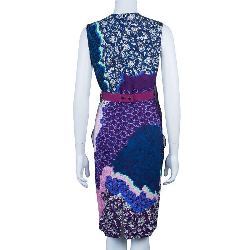 This criss cross dress by Peter Pilotto speaks volumes. It features a multicolor print with a round neckline, a sleeveless cut and a knee-length hem with criss cross frill details on the front. It also comes with a burgundy belt with a push button