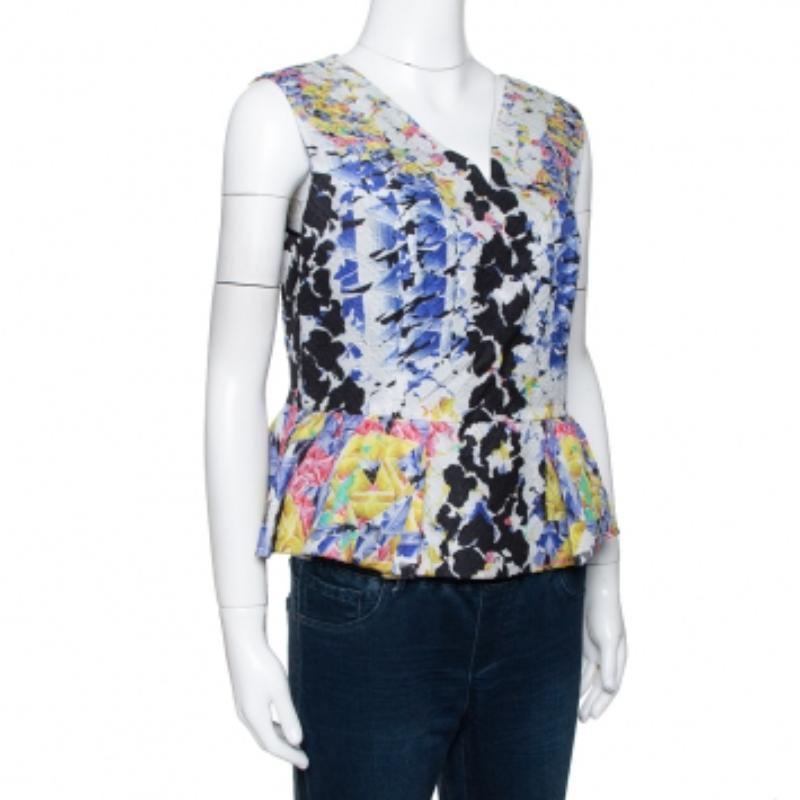 ¡Nuestros corazones han ido a parar a este top de moda de nada menos que Peter Pilotto! Está confeccionado con tejidos de calidad en un diseño estampado y tiene un bonito detalle de peplum. Tiene un encanto innegable que nunca pasará de moda.