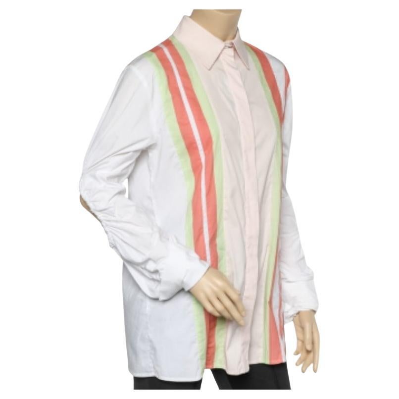 Comme cette chemise de Peters est tendance ! Confectionnée en coton rayé multicolore, cette chemise présente des découpes sur les manches. Il est doté d'une fermeture boutonnée. Mettez votre collection à jour avec cette chemise.