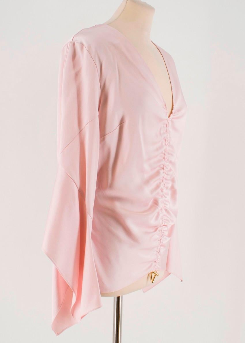 Peter Pilotto Light Pink Ruched Satin Blouse

- Light pink ruched satin-crepe blouse
- Mid-weight
- Centre-back zip fastening
- Plunging v-neck
- Long frilled sleeves 
- Non-stretchy fabric
- 68% acetate and 32% viscose

Please note, these items are