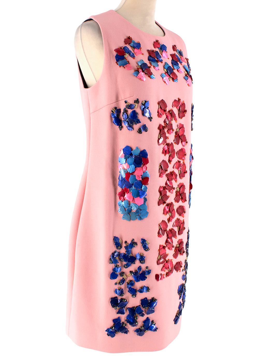 Peter Pilotto Pink Embellished Sleeveless Dress

Light pink Peter Pilotto wool crepe dress
mother of pearl style embellishments throughout, 
crew neck 
concealed zip closure at centre back
Cut for a slightly loose fit
Mid-weight, non-stretchy