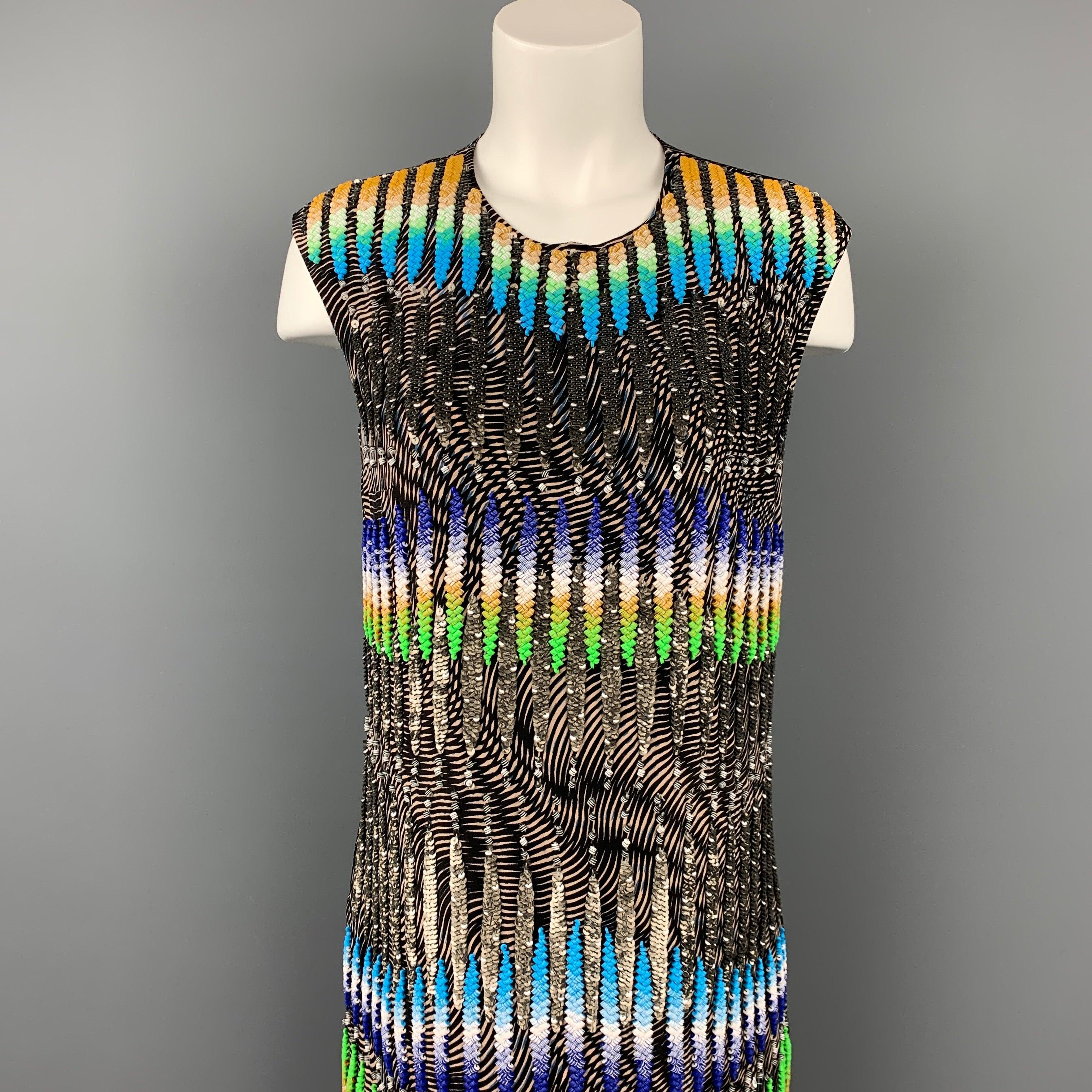 PETER PILOTTO dress comes in a black silk with sequined details featuring beaded designs made by hand, shift style, sleeveless, and a back zip up closure.
Very Good
Pre-Owned Condition. 

Marked:   10 

Measurements: 
 
Shoulder: 16.5 inches  Bust: