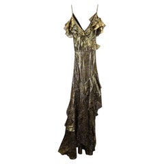 Vestido con cuello en V y volantes de Peter Pilotto, de seda dorada