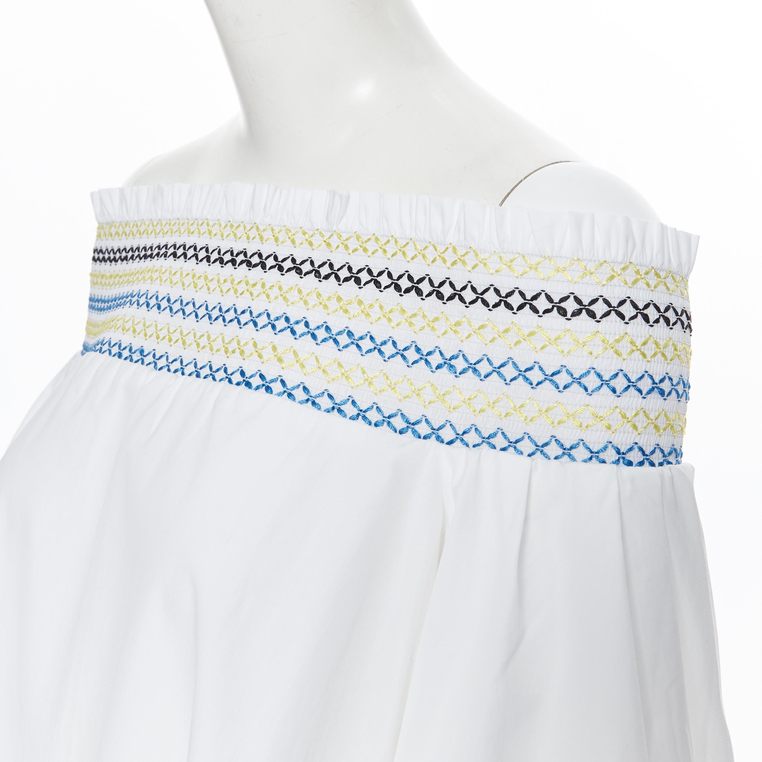 PETER PILOTTO white cotton ethnic embroidery off shoulder puff sleeve top UK6
Brand: Peter Pilotto
Designer: Peter Pilotto
Model Name / Style: Off shoulder top
Material: Cotton
Color: White
Pattern: Solid
Extra Detail: 100% cotton. Yellow, blue and
