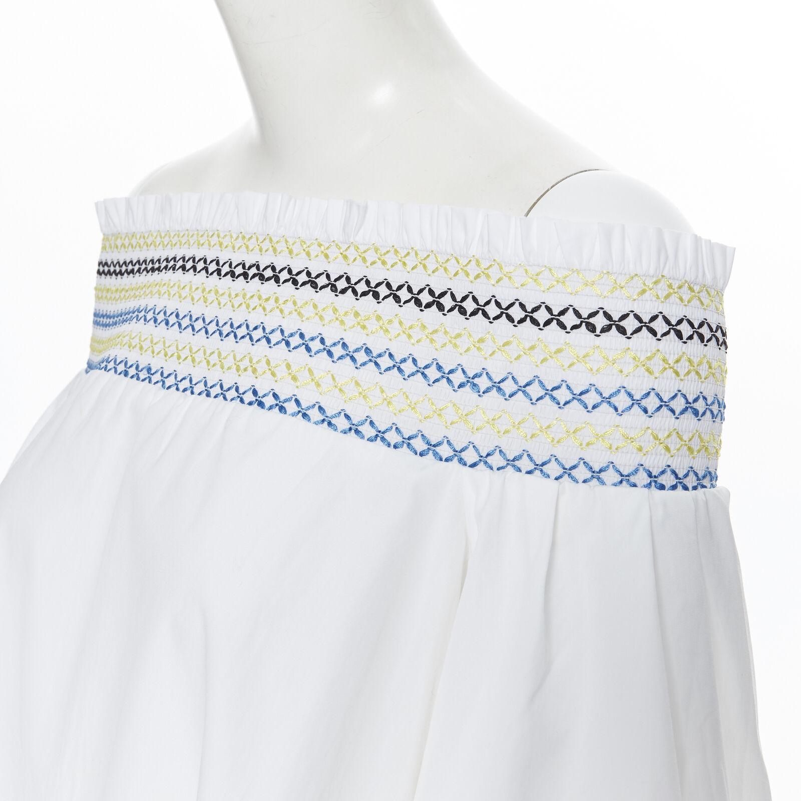 PETER PILOTTO white cotton ethnic embroidery off shoulder puff sleeve top UK6
Reference: SNKO/A00115
Brand: Peter Pilotto
Material: Cotton
Color: White
Pattern: Solid
Extra Details: 100% cotton. Yellow, blue and black embroidery. Rusched elasticated