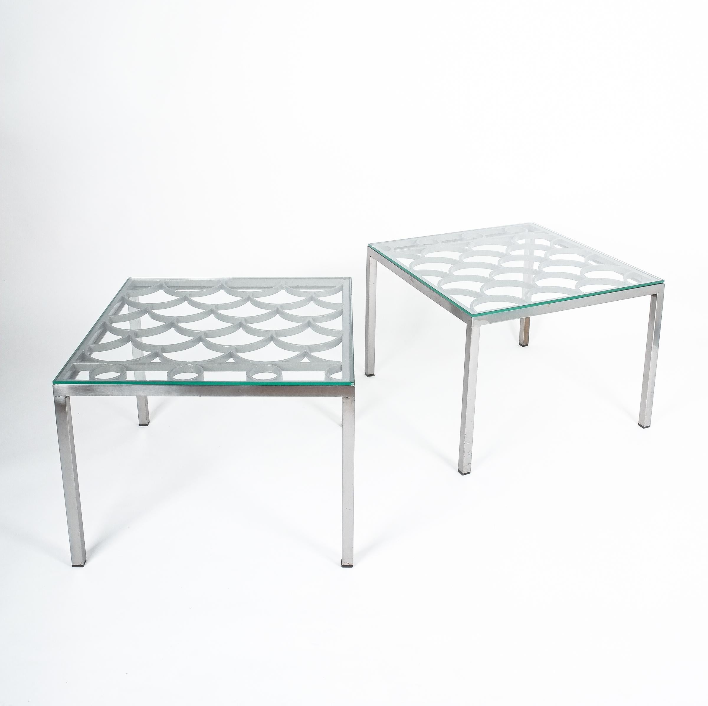 Peter Preller bespoke wrought iron steel side tables, circa 1980

Unique pair of side or coffee tables featuring recycled forged wrought iron decorative grills on top of handmade steel bases. Measures: 24