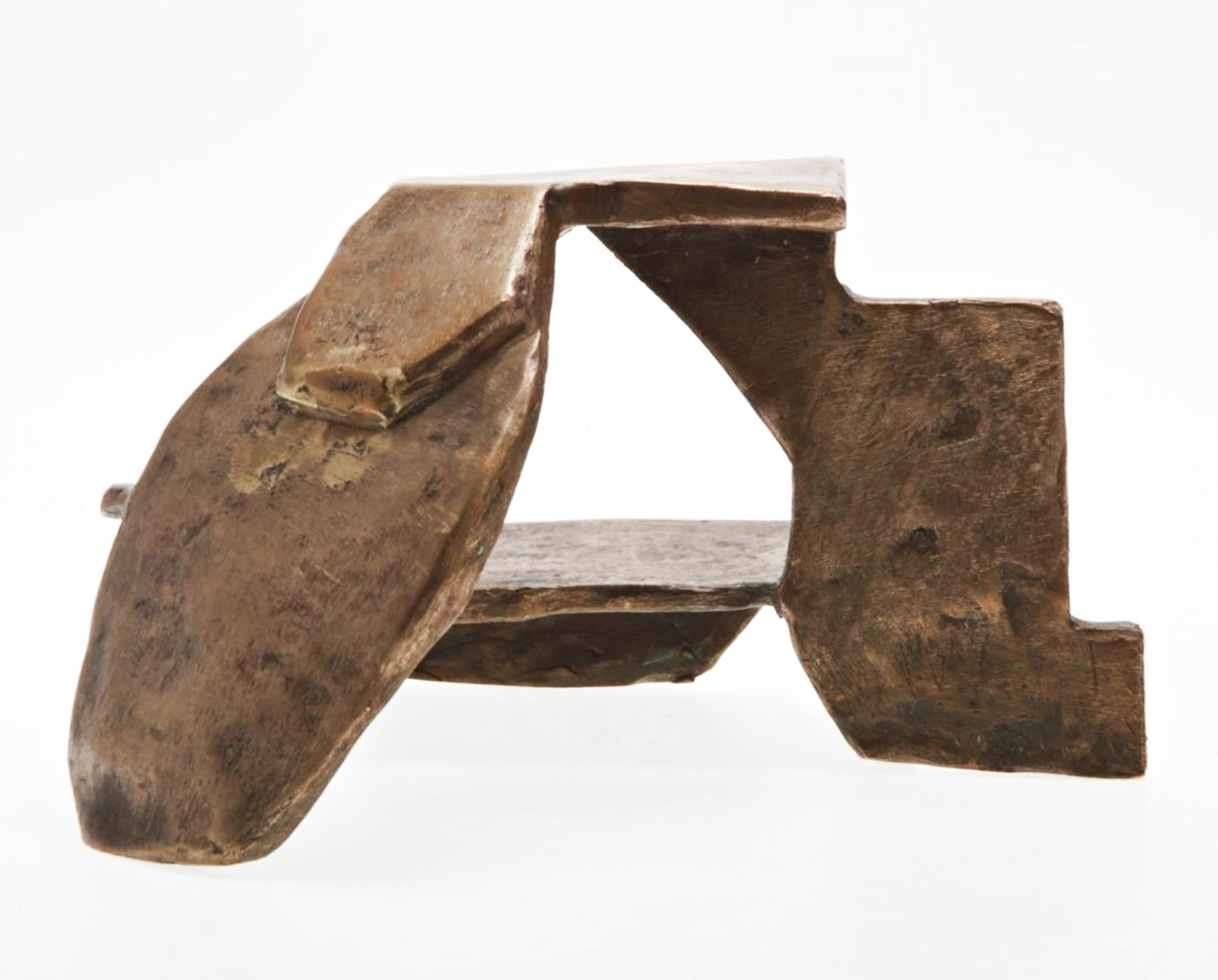 Peter Reginato
Abstract Bronze Sculpture, ca. 1987
Bronze
Signed on the underside
4 × 6 1/2 × 5 1/2 inches
This bronze sculpture is by the American abstract sculptor Peter Reginato. This artwork's interplay of positive and negative space creates a