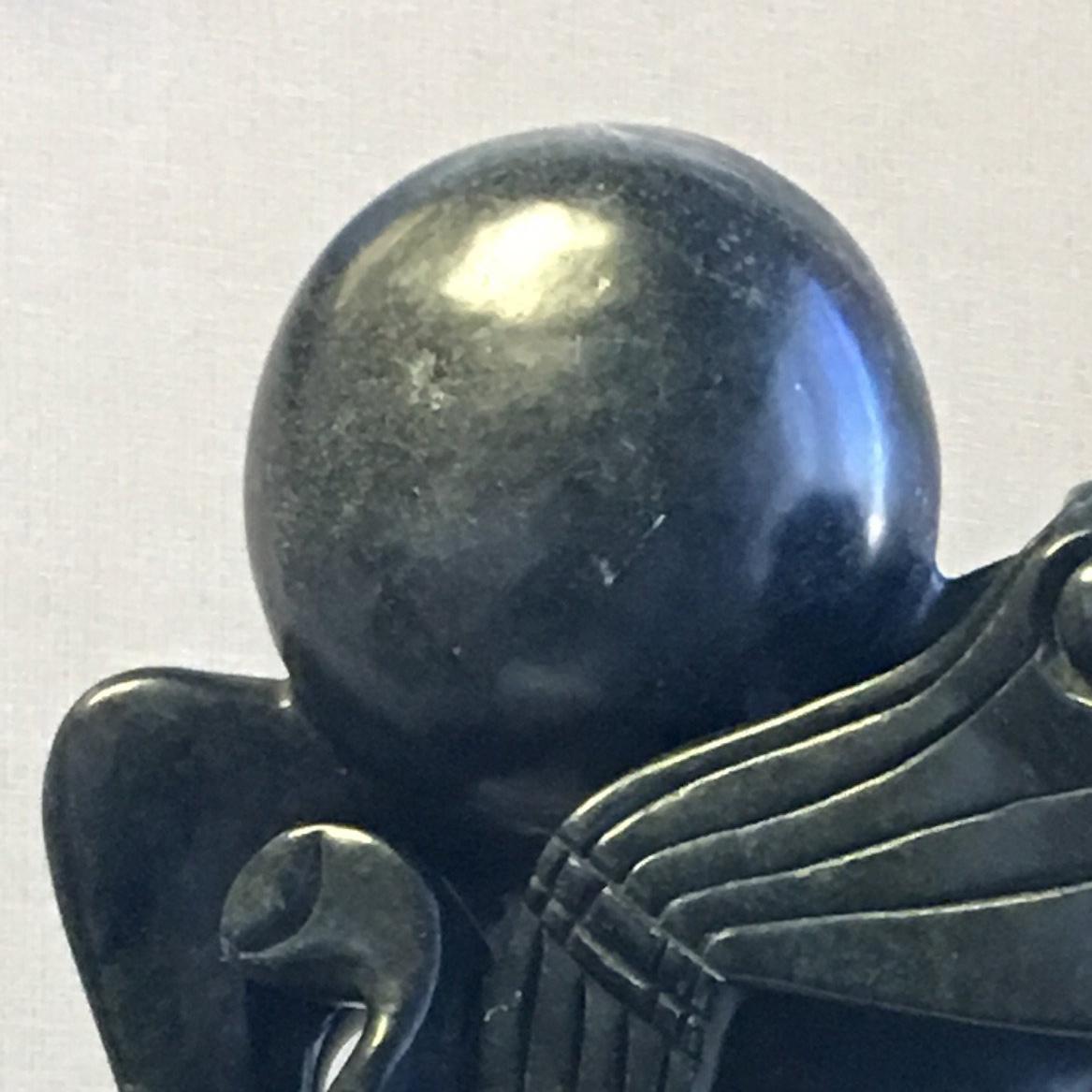 Le musicien - Sculpture de Peter Rujuwa