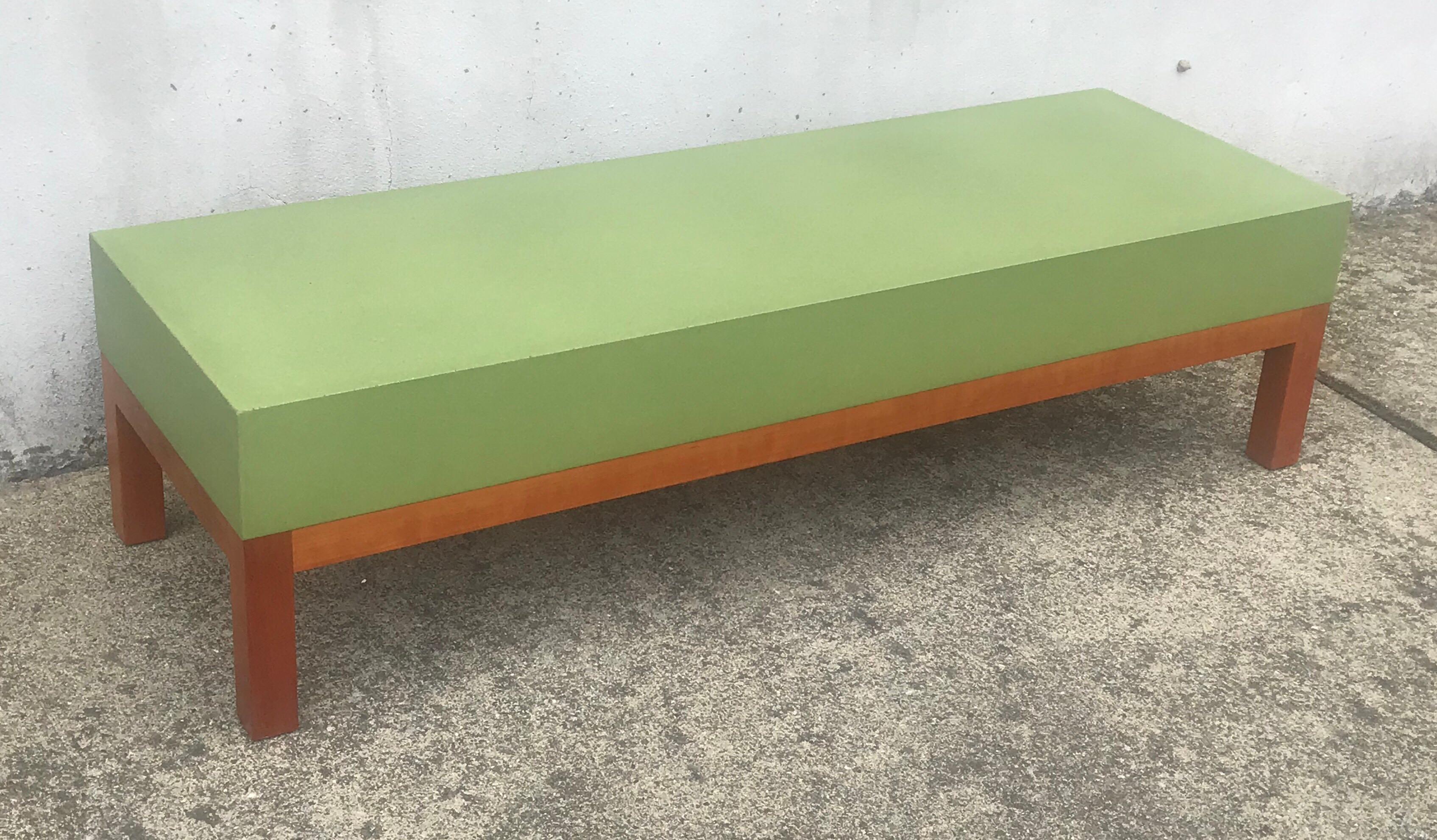 Beautiful low stance rectangular coffee table by Peter Sandback in the style of Ettore Sottsass.  Vibrant green thick composite top mounted on solid walnut frame, early 2000’s, hallmarked.