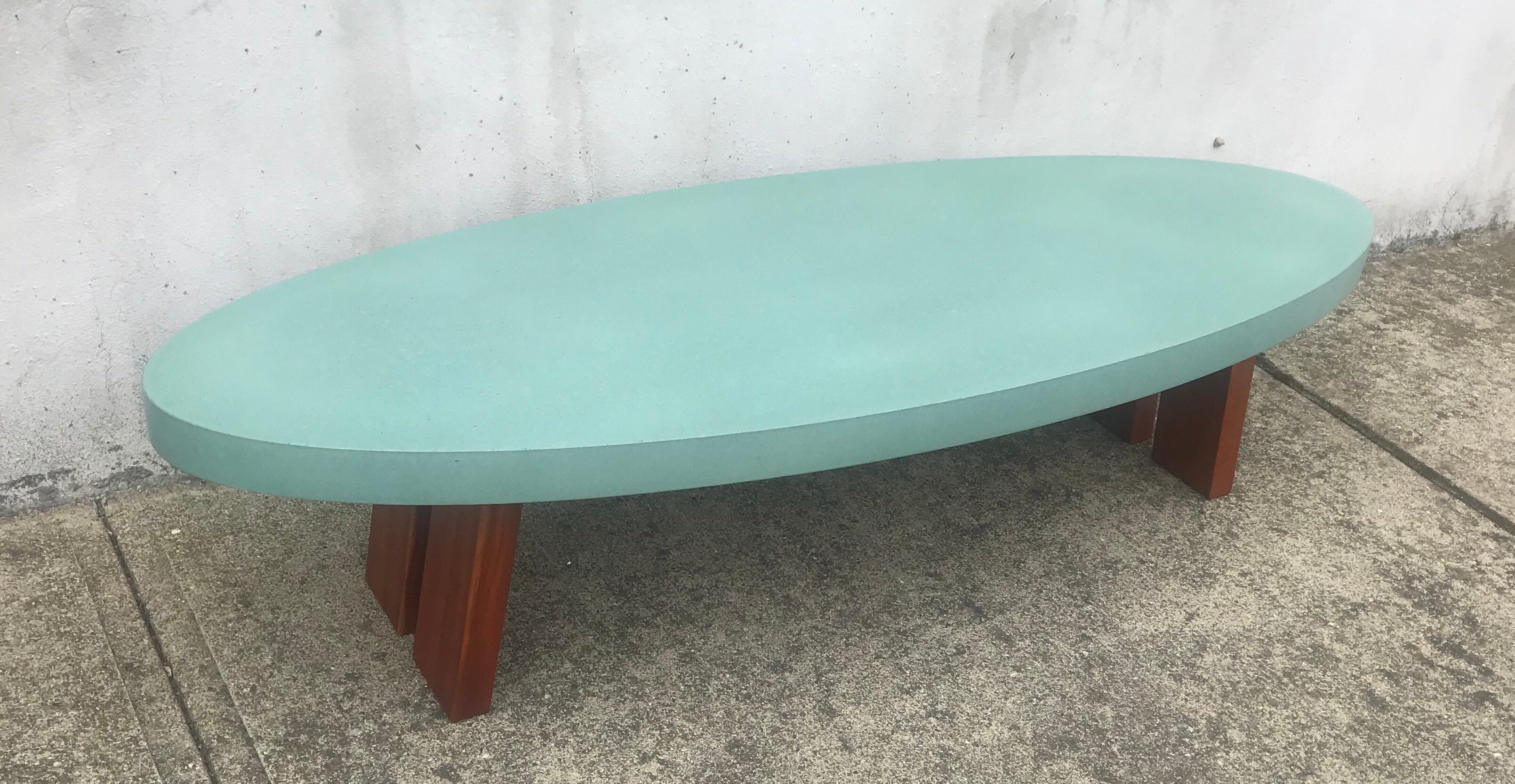 Very cool oval coffee table by a Peter Sandback, Memphis design in the style of Ettore Sottsass.  Thick composite top resting on solid walnut frame, early 2000’s, hallmarked.