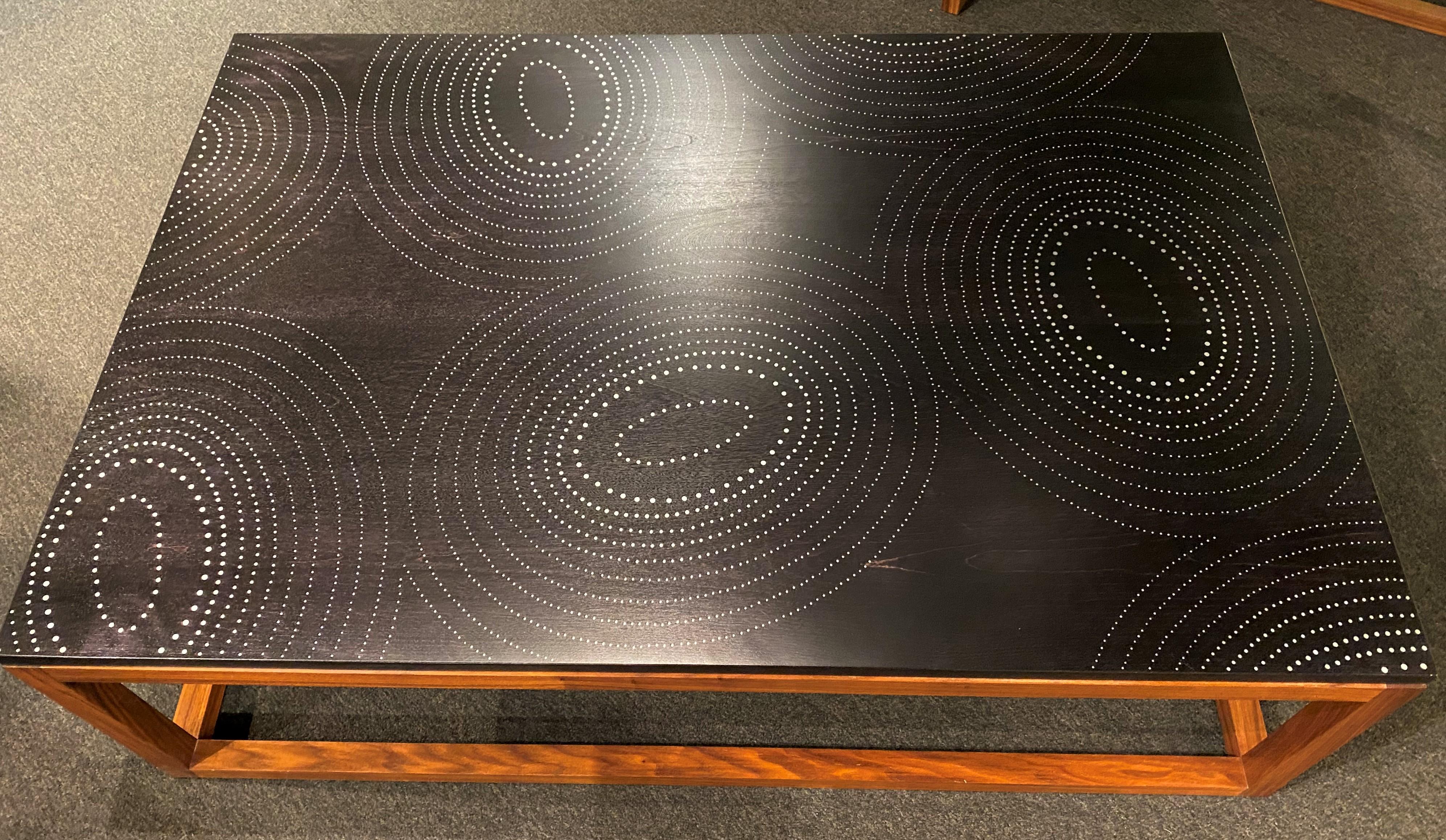 A fine custom modernist rectangular walnut low table with aluminum nail concentric circle inlay, handcrafted by Peter Sandback. Sandback has gained a national reputation for his intricate pattern work of inlaid nails set into minimalist handmade