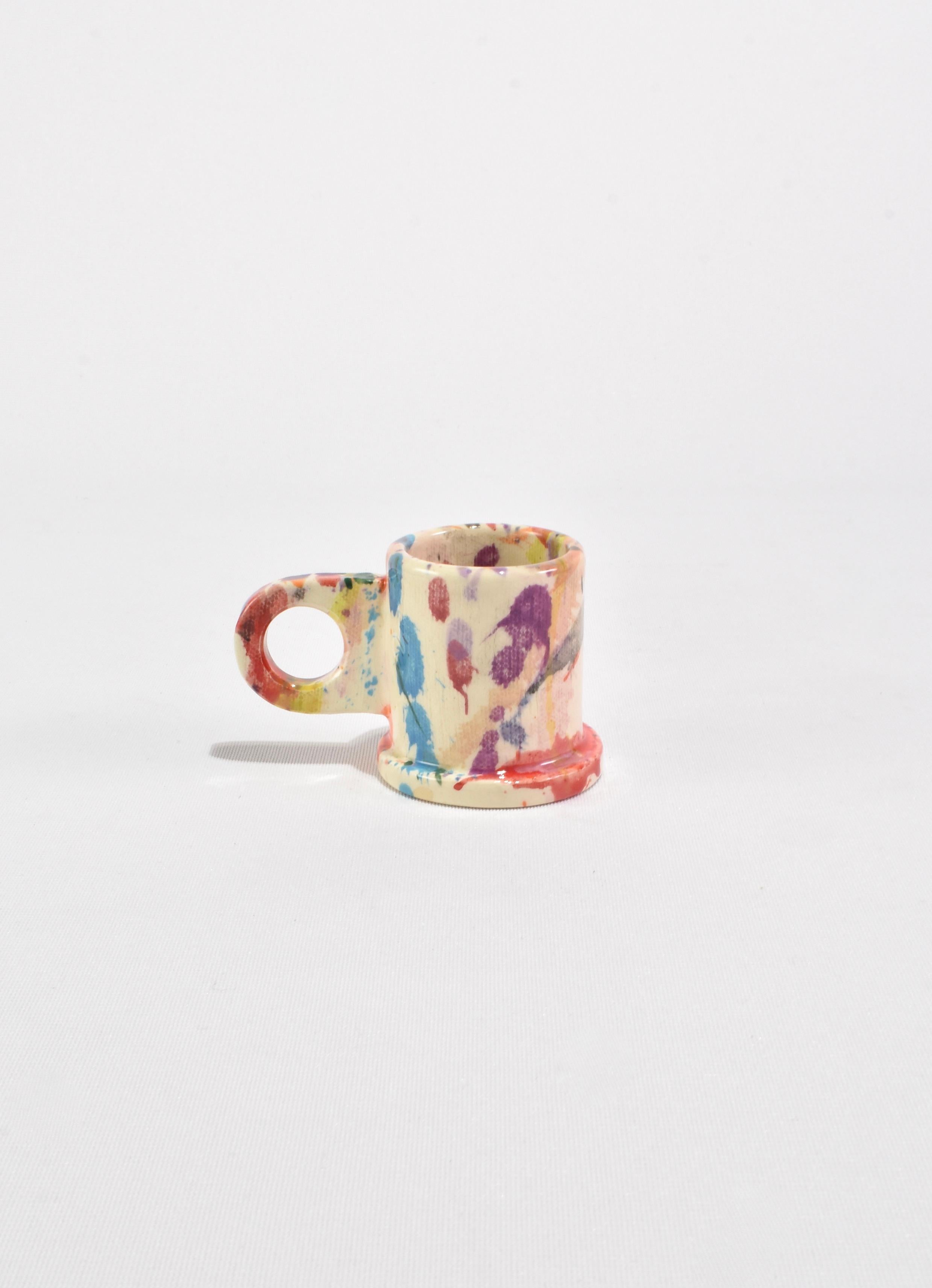 One-of-a-kind Espresso Splatter Mugs designed by Peter Shire. These functional and sculptural mugs are crafted by Echo Park Pottery in Los Angeles using slab construction and individually hand-painted. Stamped on base: EXP 2023. Sold