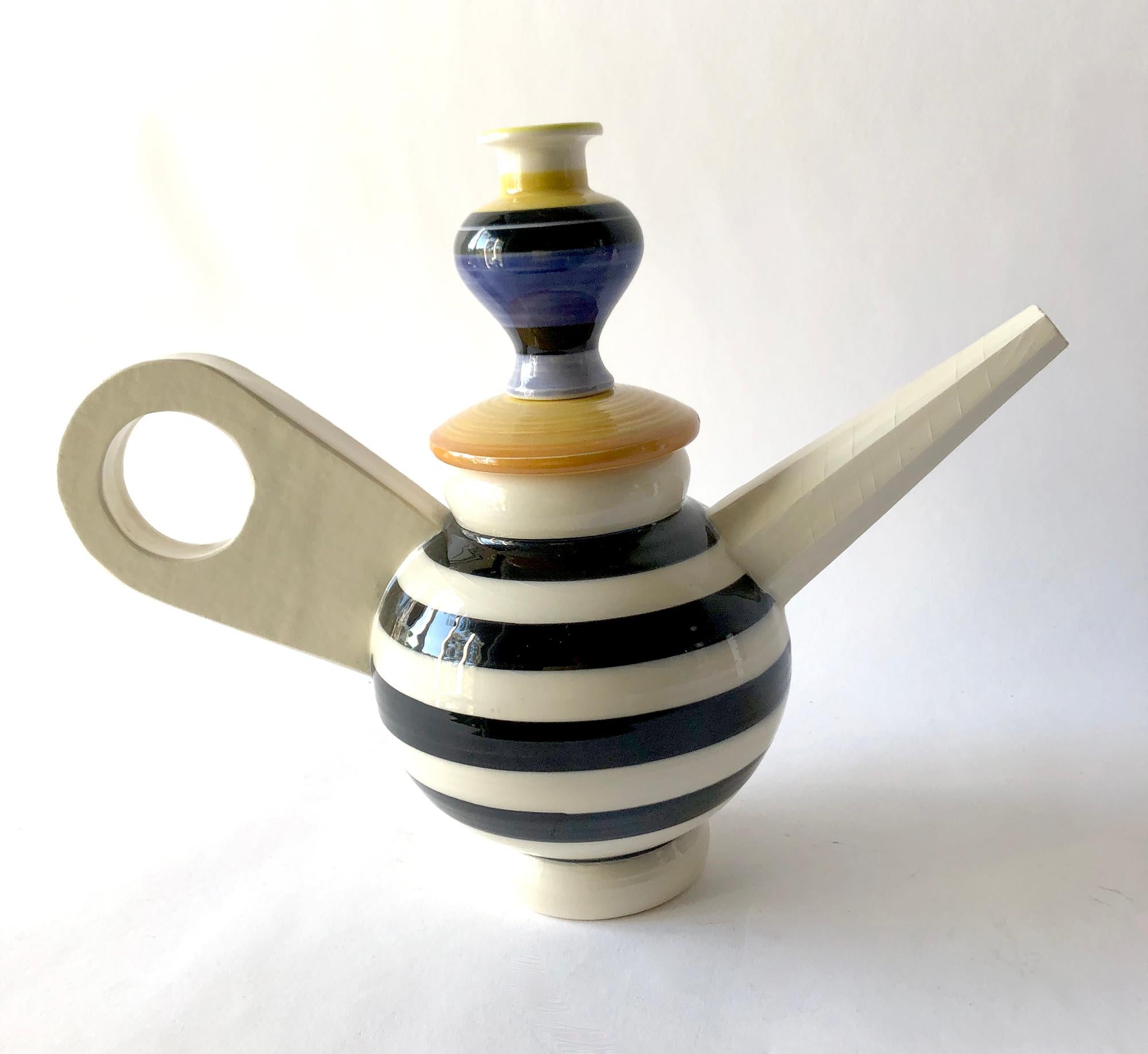 Spouted teapot created by Los Angeles artist and designer of the Memphis Group, Peter Shire. Teapot measures 12.5