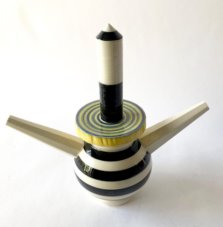 Spouted teapot created by Los Angeles artist and designer of the Memphis Group, Peter Shire. Teapot measures: 10