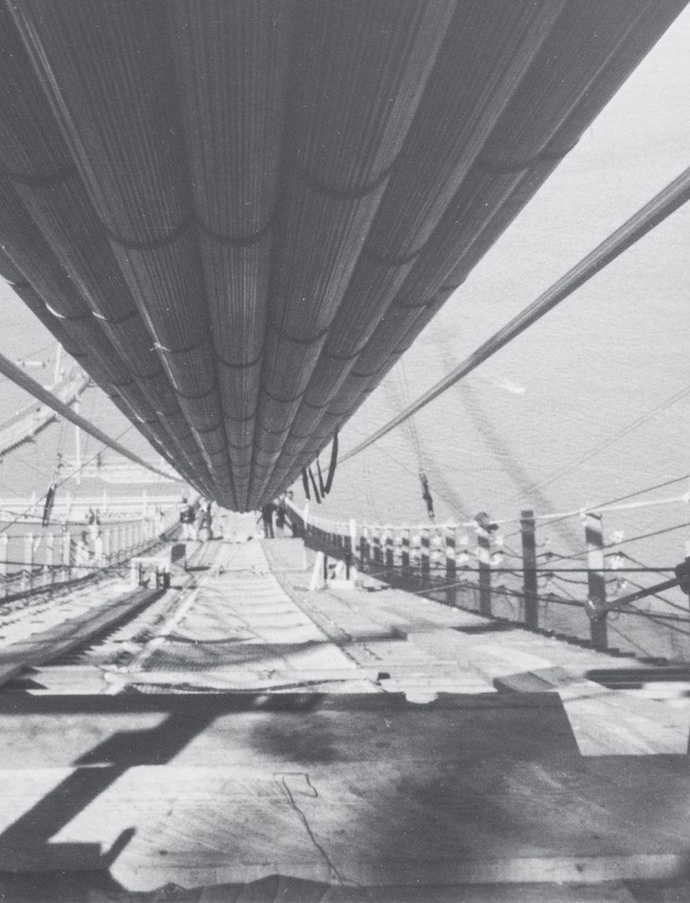 Golden Gate Bridge Workers - Gray Black and White Photograph by Peter Stackpole