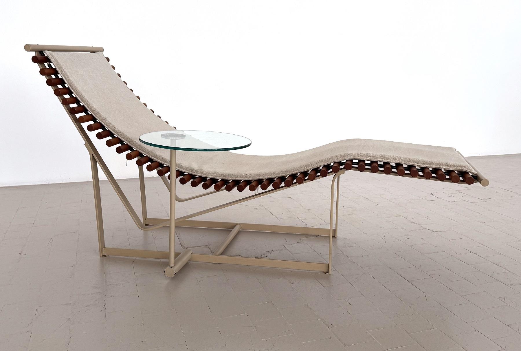 Peter Strassl Lounge Chair Chaise Longue for Strässle International, 1970s

Sculptural shaped lounge chair designed by Peter Strassl, Germany 1978. 
This beautiful shaped lounge chair with attached rotatable crystal glass table has solid beech