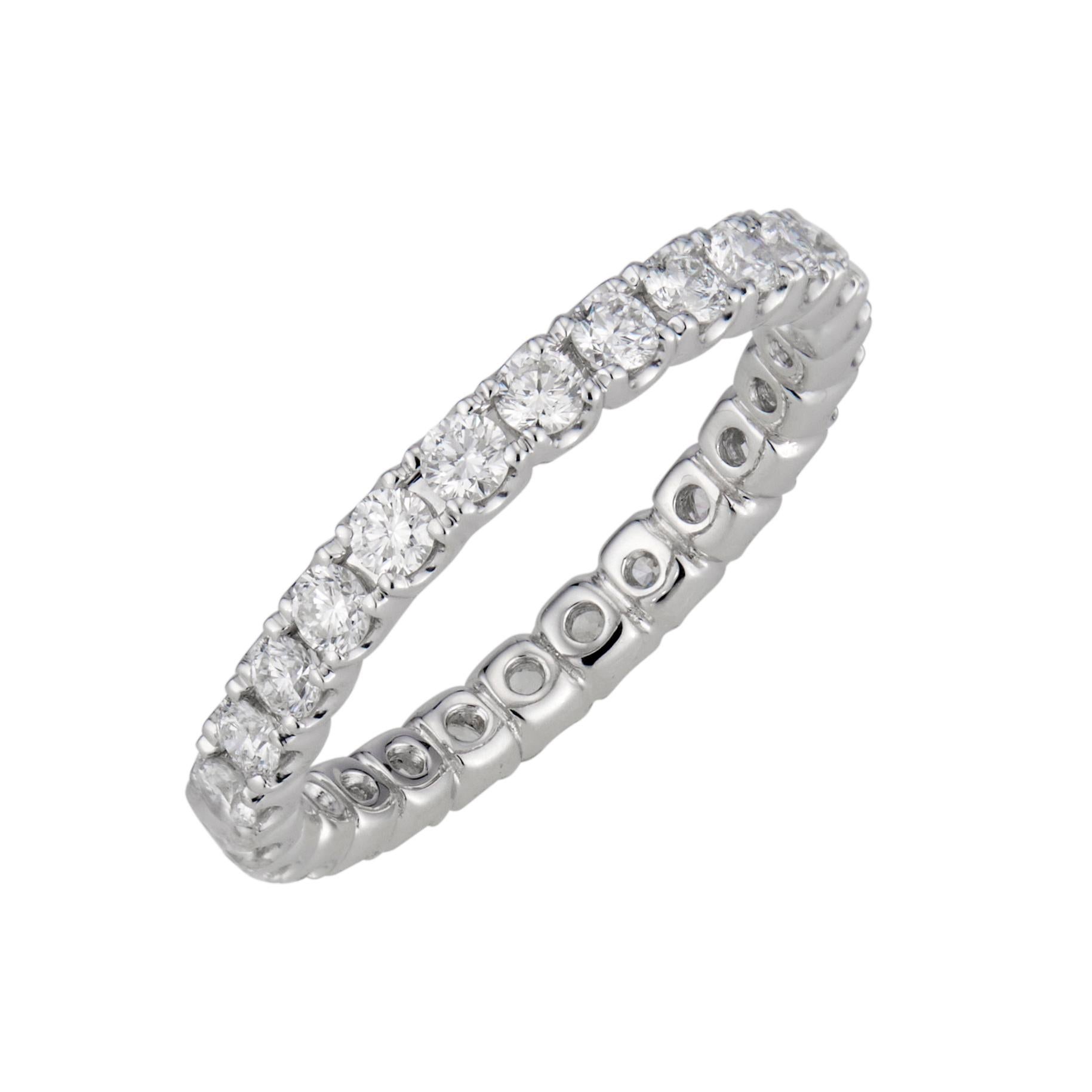 Ideal cut diamond eternity wedding band ring in platinum.  26 round brilliant cut diamonds.  This ring is not sizable.  It can be ordered in any size or metal. Designed and crafted in the Peter Suchy workshop. 

26 round brilliant cut diamonds F-G