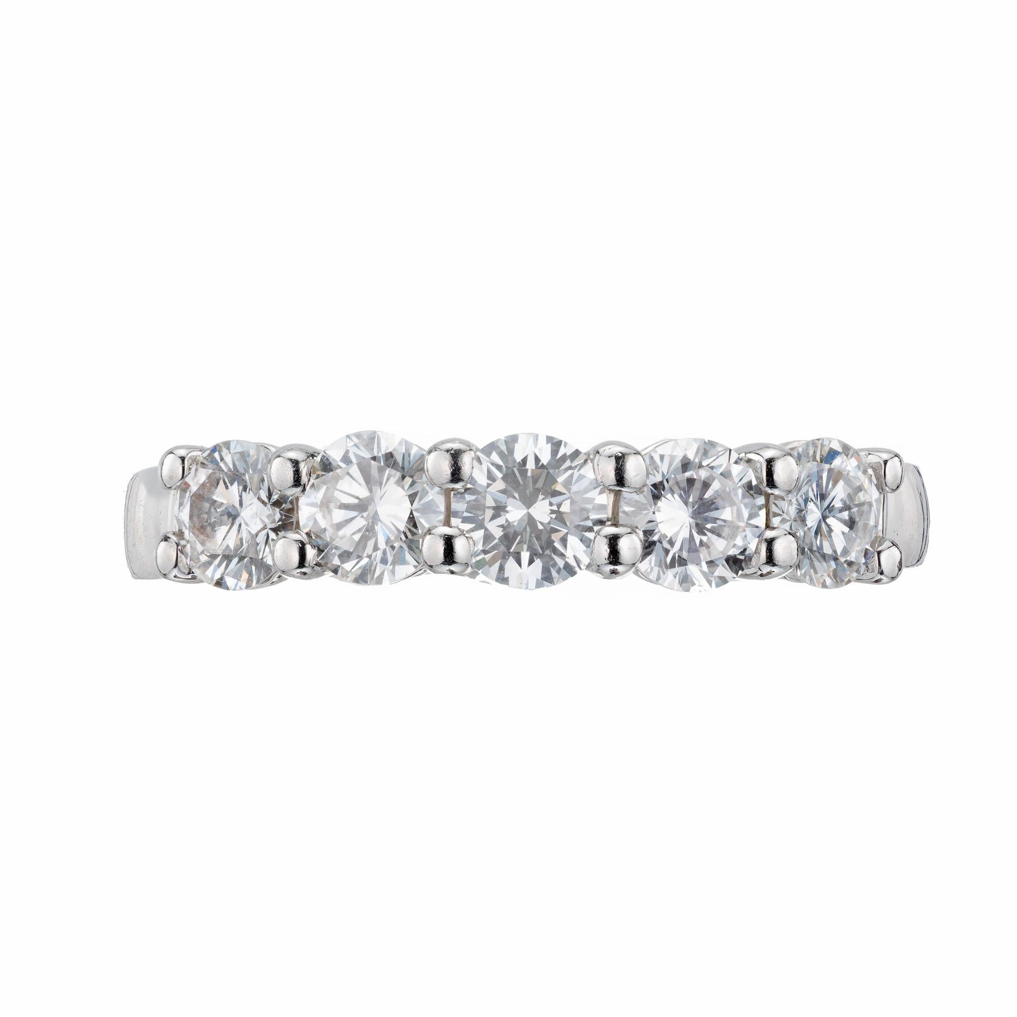  Low set common prong solid Platinum 1.00ct Diamond wedding band.

5 round brilliant cut Diamonds, approx. total weight 1.00cts, F – G, VS2 – SI1 
 Size 6 and sizable 
Platinum 
Tested: Platinum 
Stamped: Plat 
6.2 grams 
Width at top: 3.7mm
Height