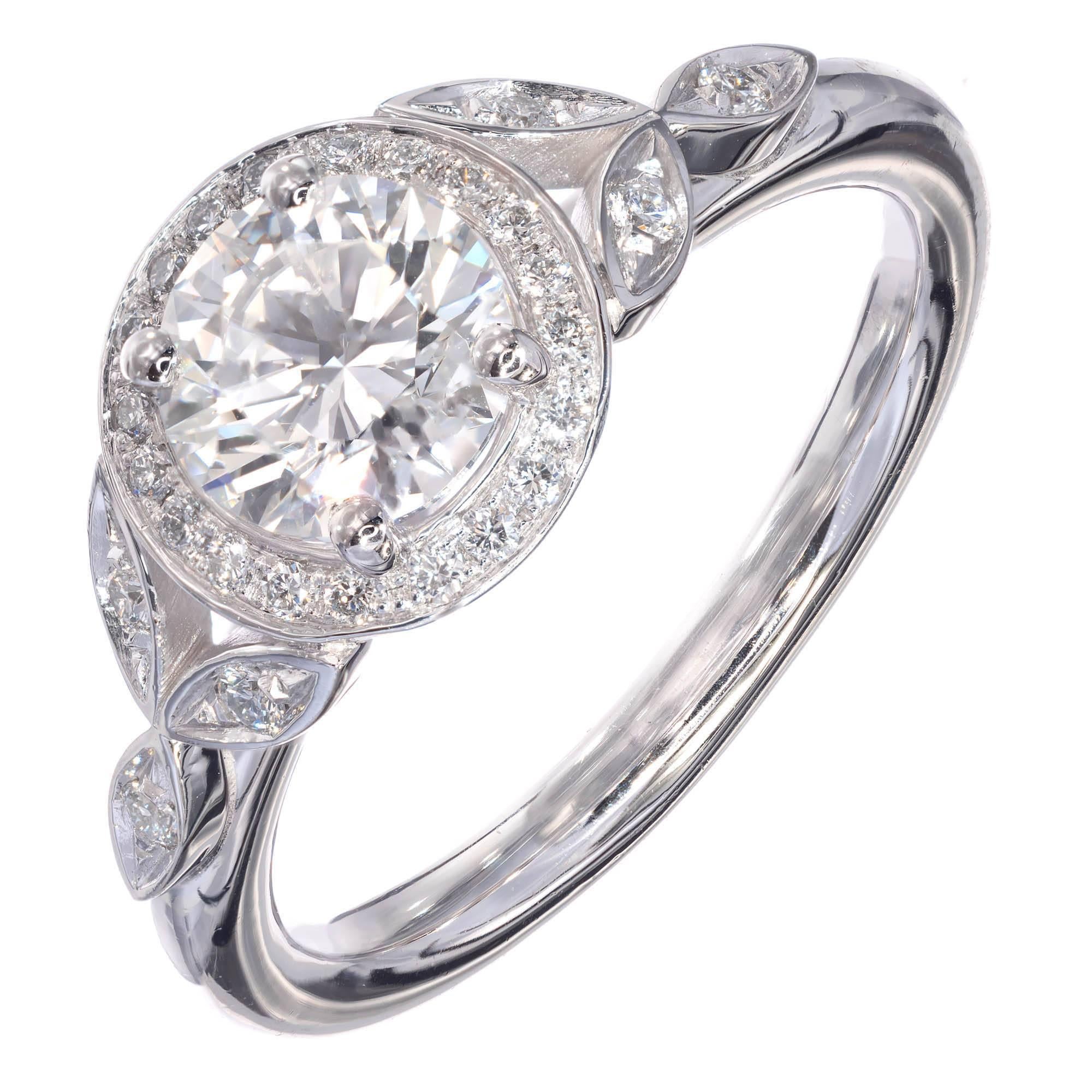 Peter Suchy original design Diamond halo engagement ring with Vintage Inspired design. GIA certified center round brilliant cut Diamond, extra bright and sparkly in a simple classic platinum setting. Designed to fit flush against a wedding band.