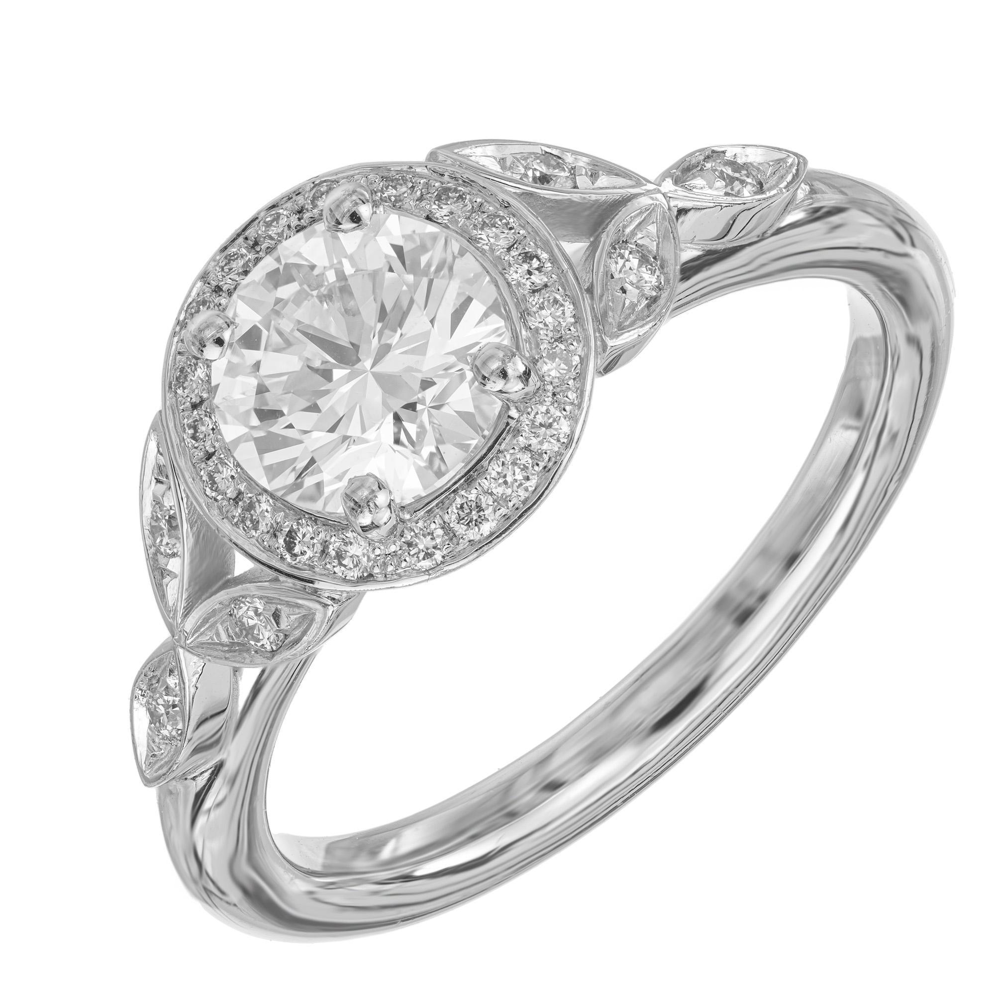 Peter Suchy original Diamond halo engagement ring with vintage inspired design. GIA certified center round brilliant cut 1.01ct Diamond accented with diamond halo. Extra bright and sparkly in a unique platinum setting. Designed to fit flush against