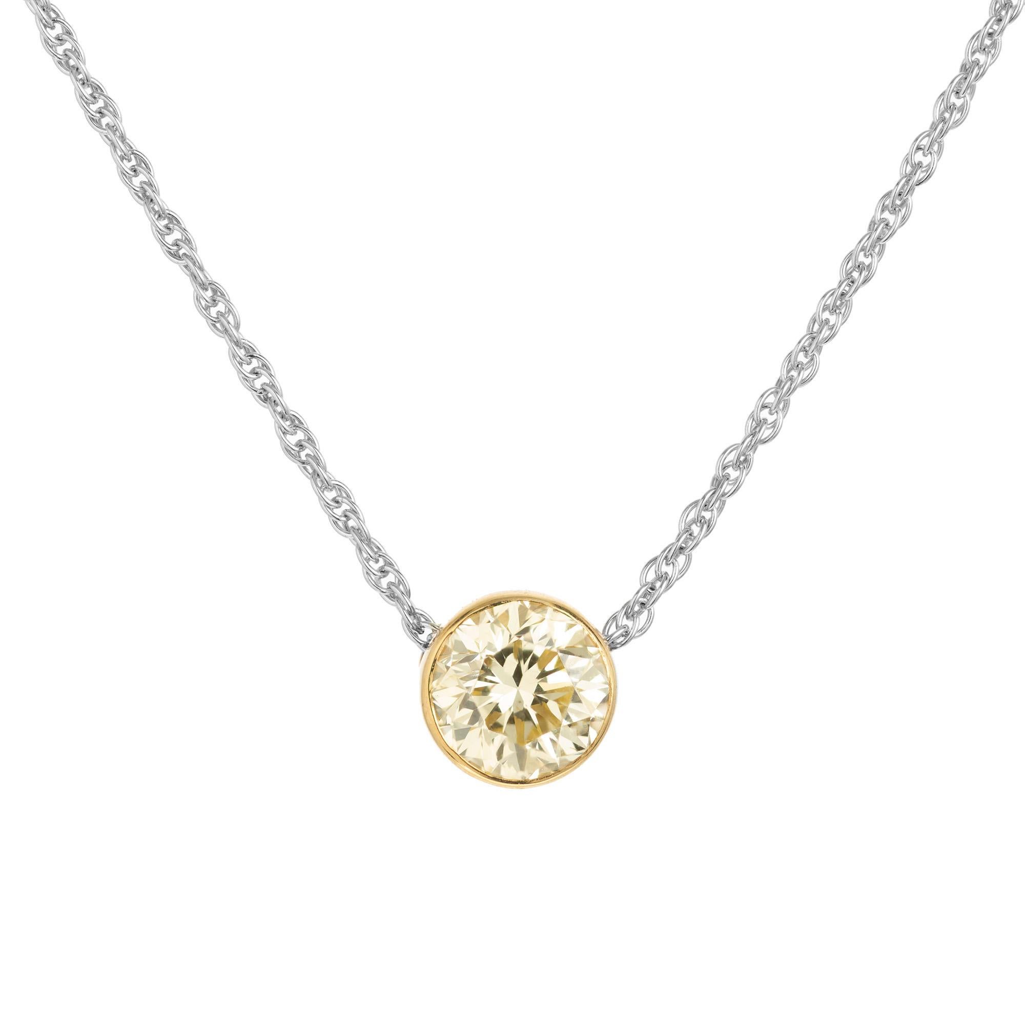 Discover timeless elegance with the Peter Suchy 1.02ct fancy yellow diamond platinum pendant necklace, a masterpiece that harmonizes sophistication and luxury. This pendant necklace exudes charm, featuring a 1.02 carat round fancy yellow diamond