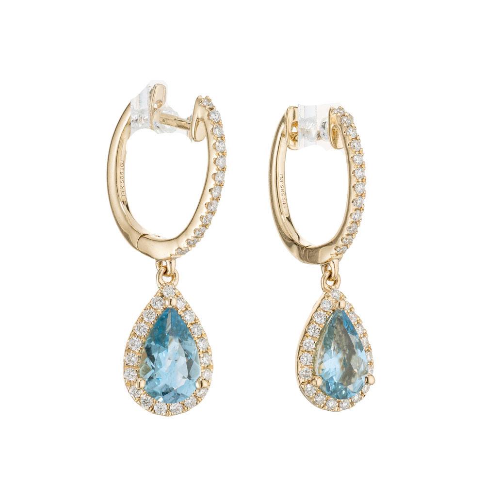 Aqua and diamond dangle earrings. 2 pair shaped aquamarine dangles with round diamond halos and diamonds along the hoops. Designed and crafted in the Peter Suchy workshop

2 blue aquamarine, approx. 1.03cts
62 round brilliant cut diamonds, H-I Si