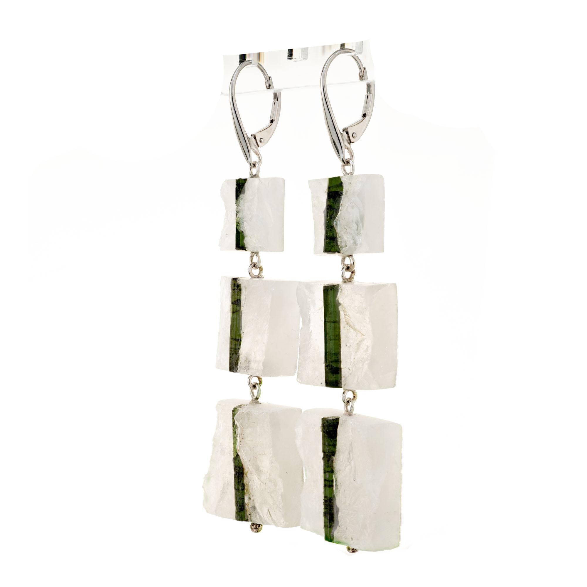 Quartz crystal dangle earrings with green tourmaline mineral crystal inclusions. Graduated quart crystal with tourmaline strips. Designed and crafted in the Peter Suchy workshop

6 square white/ green slabs rock crystal quartz with green tourmaline,