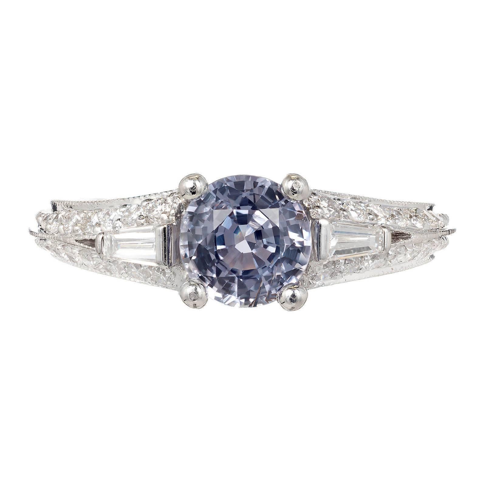 Peter Suchy GIA Certified, old European cut, color change Sapphire and diamond engagement ring. The  1.06cts center stone Changes color from violet blue to light pinkish purple in different lights. The Sapphire is from a 1900’s estate. The ring is