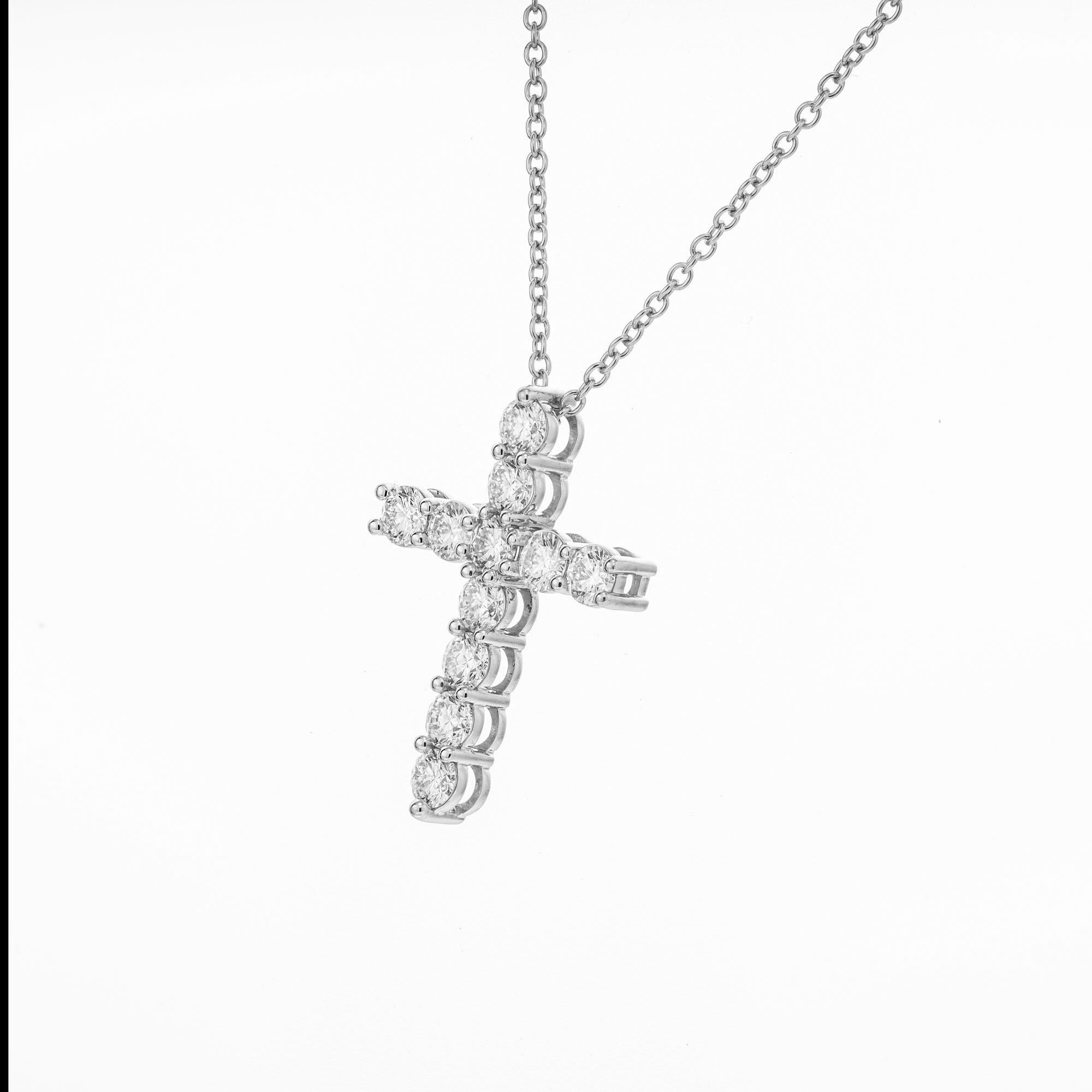 Peter Suchy 1.09 carat brilliant cut 11 diamond cross pendant necklace in platinum. 18 inch length chain.

11 round brilliant cut diamonds, F-G VS approx. 1.09cts
Platinum 
5.3 grams
Chain: 18 Inches- with jump ring at 16 Inches to shorten 
