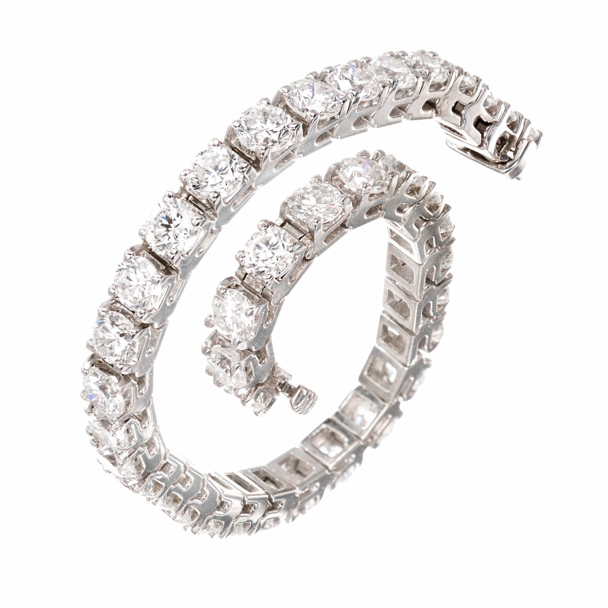  Peter Suchy hinged link brilliant cut Diamond tennis bracelet with 11.00ct of bright white sparkly Diamonds. 14k white gold bracelet with built in hidden catch and underside safety. 

38 round brilliant cut Diamonds, approx. total weight 11.00cts,