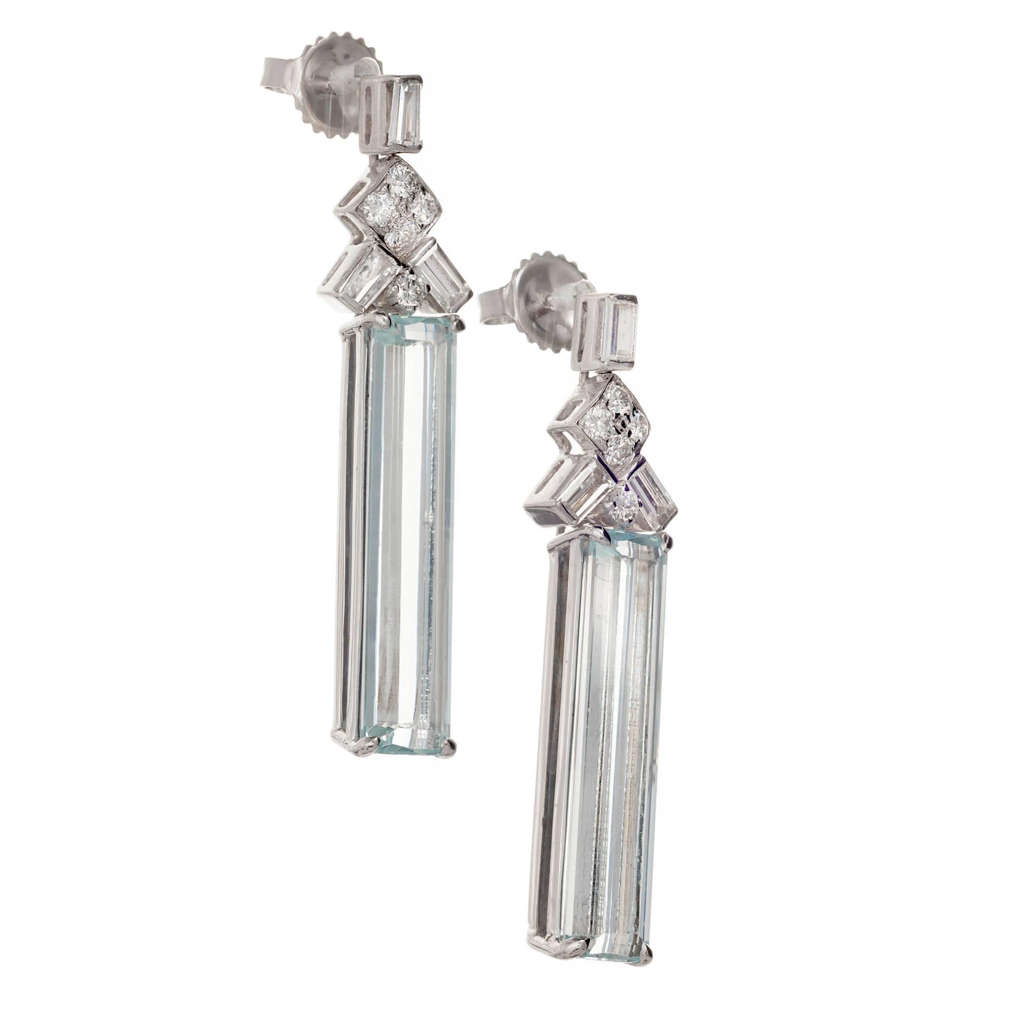 Peter Suchy natural untreated aqua dangle earrings. The diamonds and aqua are from a 1940’s estate.  The earrings are made in an Art Deco style in the Peter Suchy workshop. The posts are 18k white gold. The backs and earrings are 14k white gold.

6