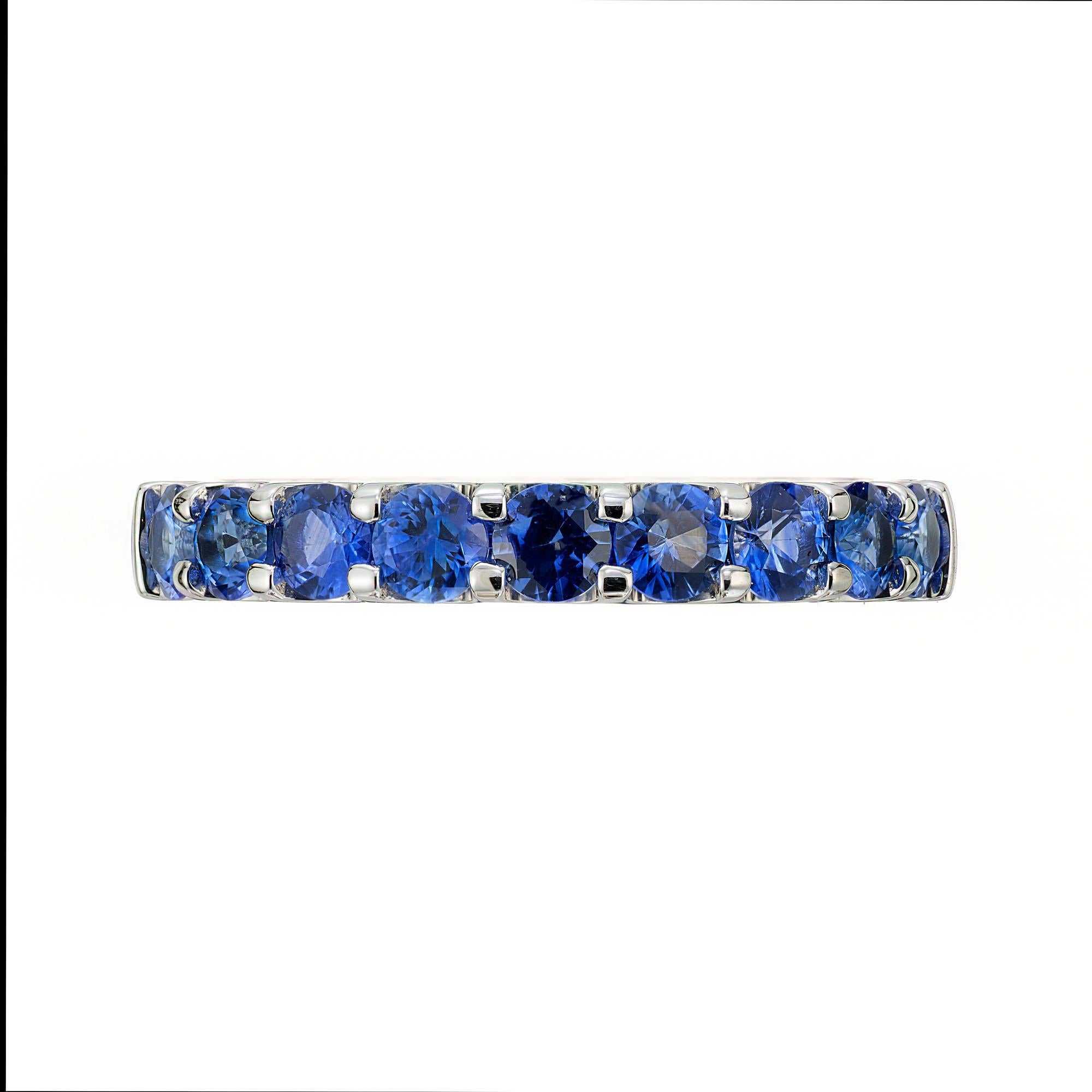 Sapphire wedding band ring. Ceylon sapphire common prong ring set low to the finger in platinum. Designed and crafted in the Peter Suchy workshop. Can be made in any finger size. 

9 round blue sapphires, VS approx. 1.12cts
Platinum 
Size: 6.5 and