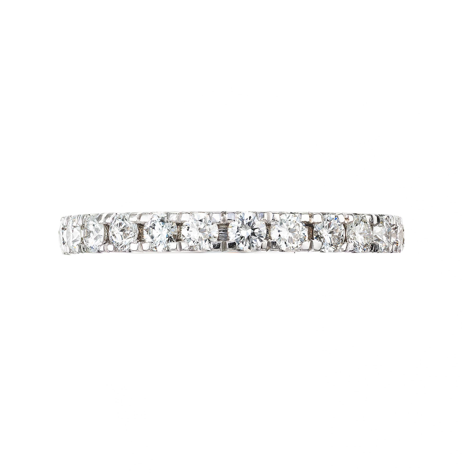 1.13 carat, 25 round diamond in a custom groove set diamond platinum eternity setting from the Peter Suchy workshop.

25 round brilliant cut diamond F-G VS, approx. 1.13ct
Size 6.5 and sizable (order only)
Platinum 
Stamped: PLAT
4.4 grams
Width at
