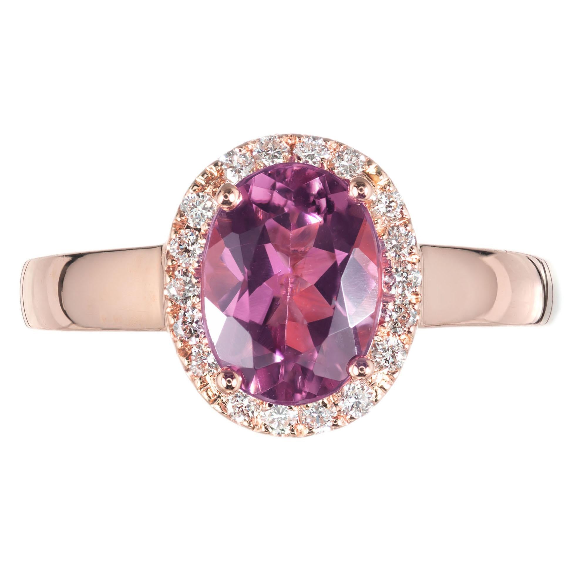 Peter Suchy oval pink Tourmaline & Diamond halo engagement ring. Oval pink center tourmaline with a halo of 18 round full cut diamonds in a 18k rose gold setting. 

1 oval pink Tourmaline, 1.20cts, SI, 8.6mm
18 round full cut Diamonds, approx. total